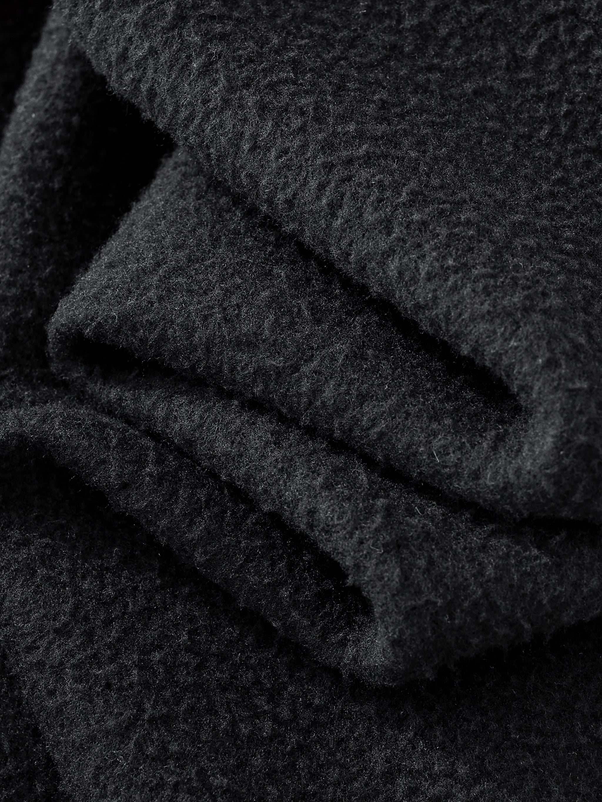 Close-up of dark gray textured fabric
