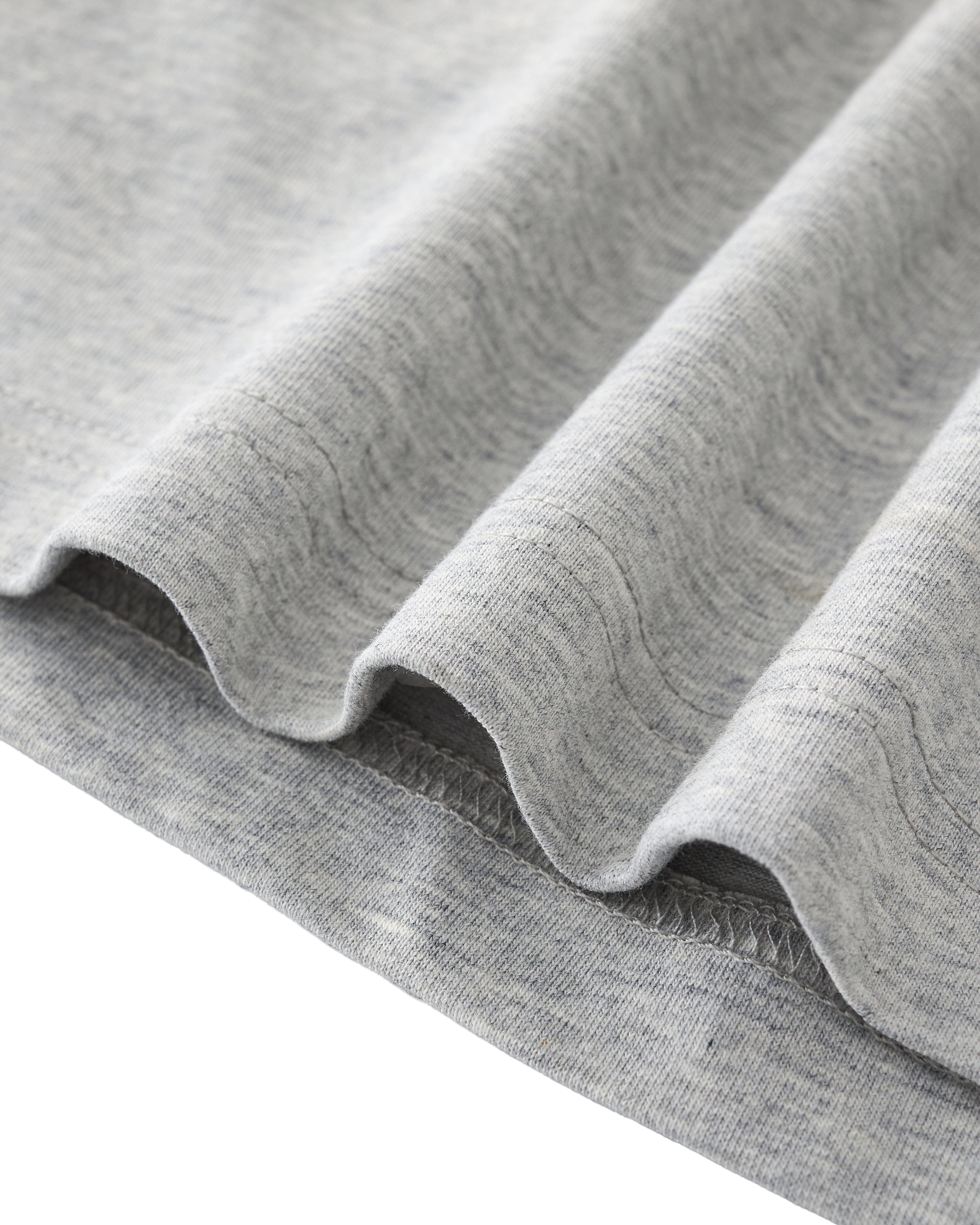 Close-up of gray fabric with a white background