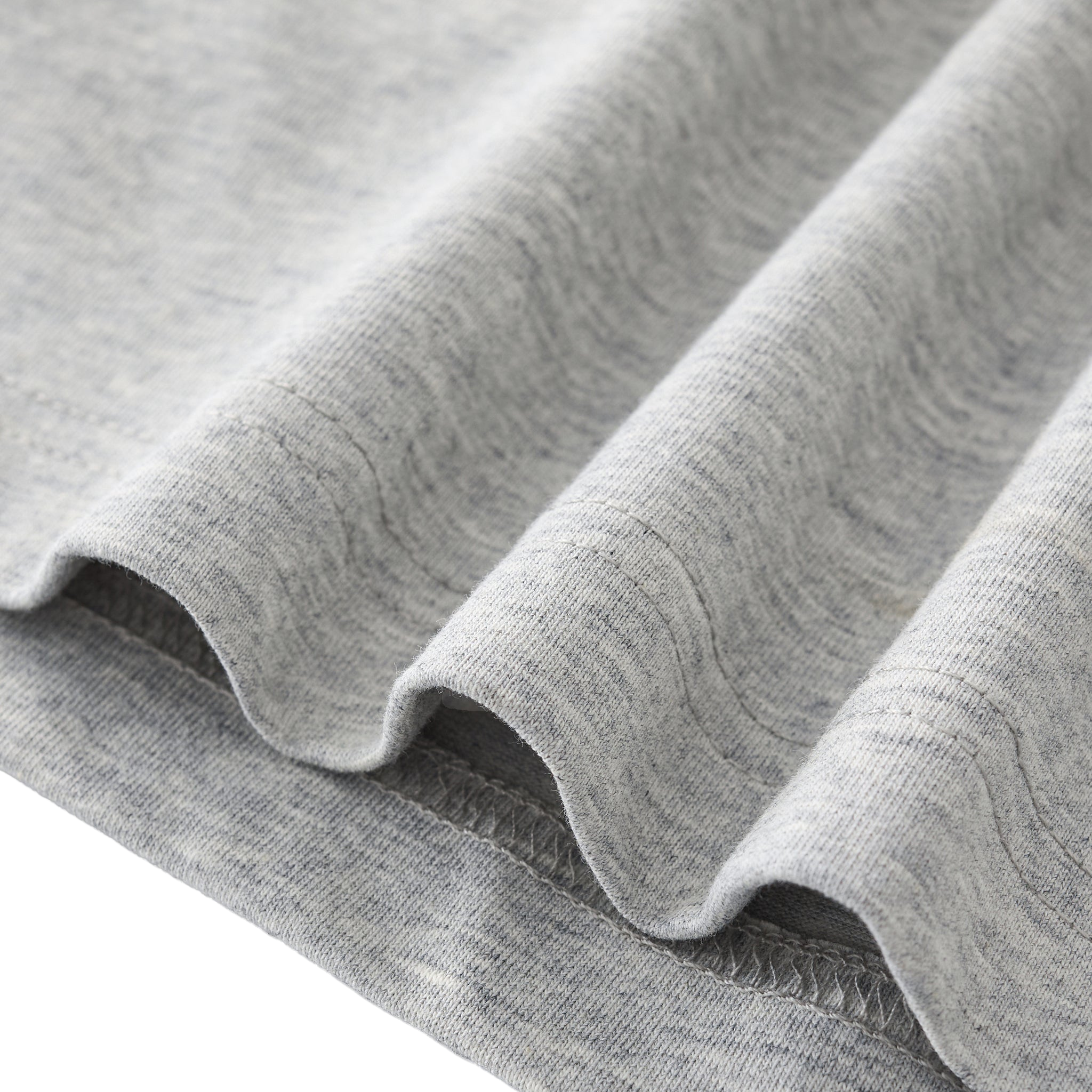 Close-up of gray fabric with a white background