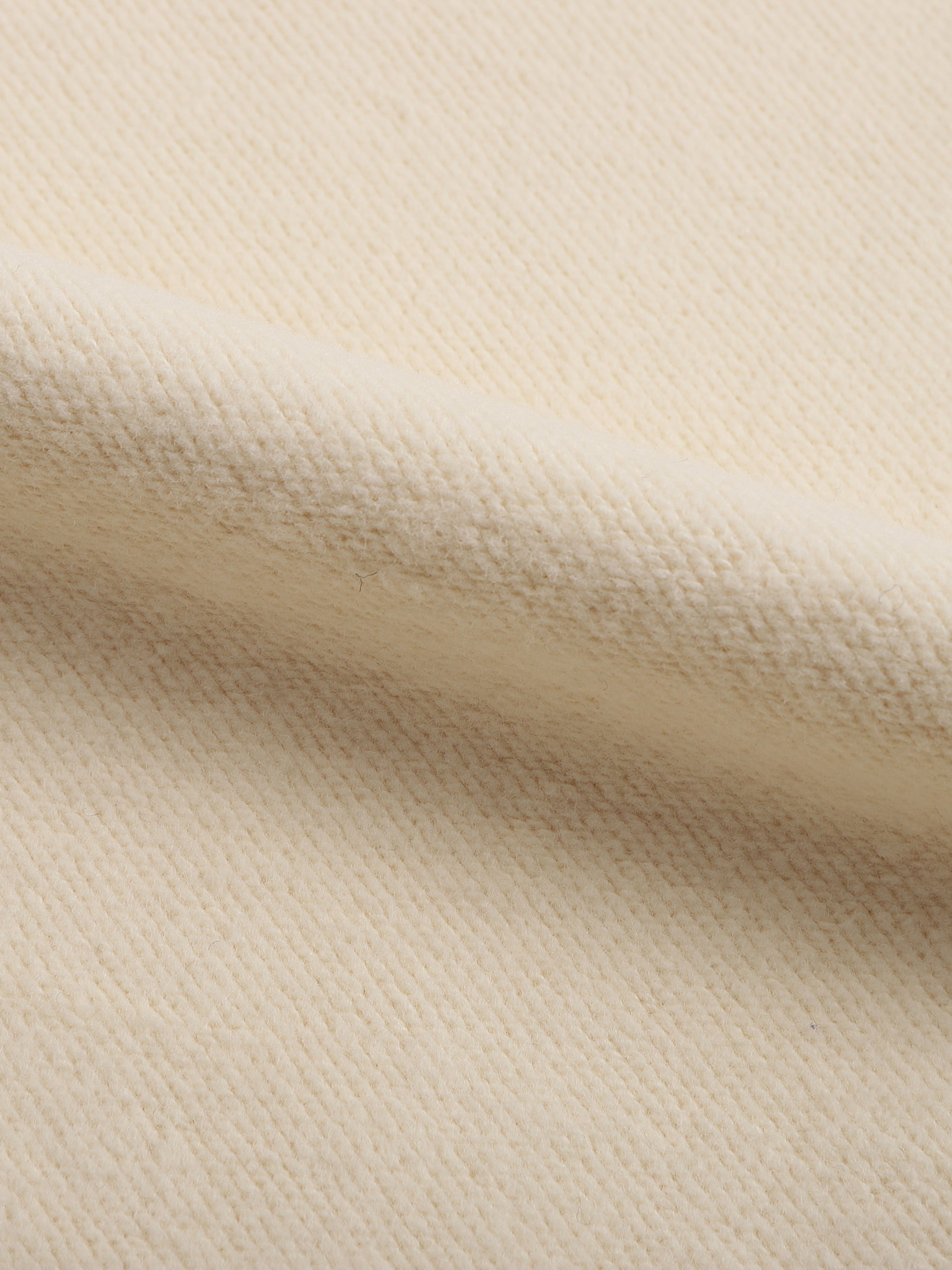 Close-up of beige fabric texture