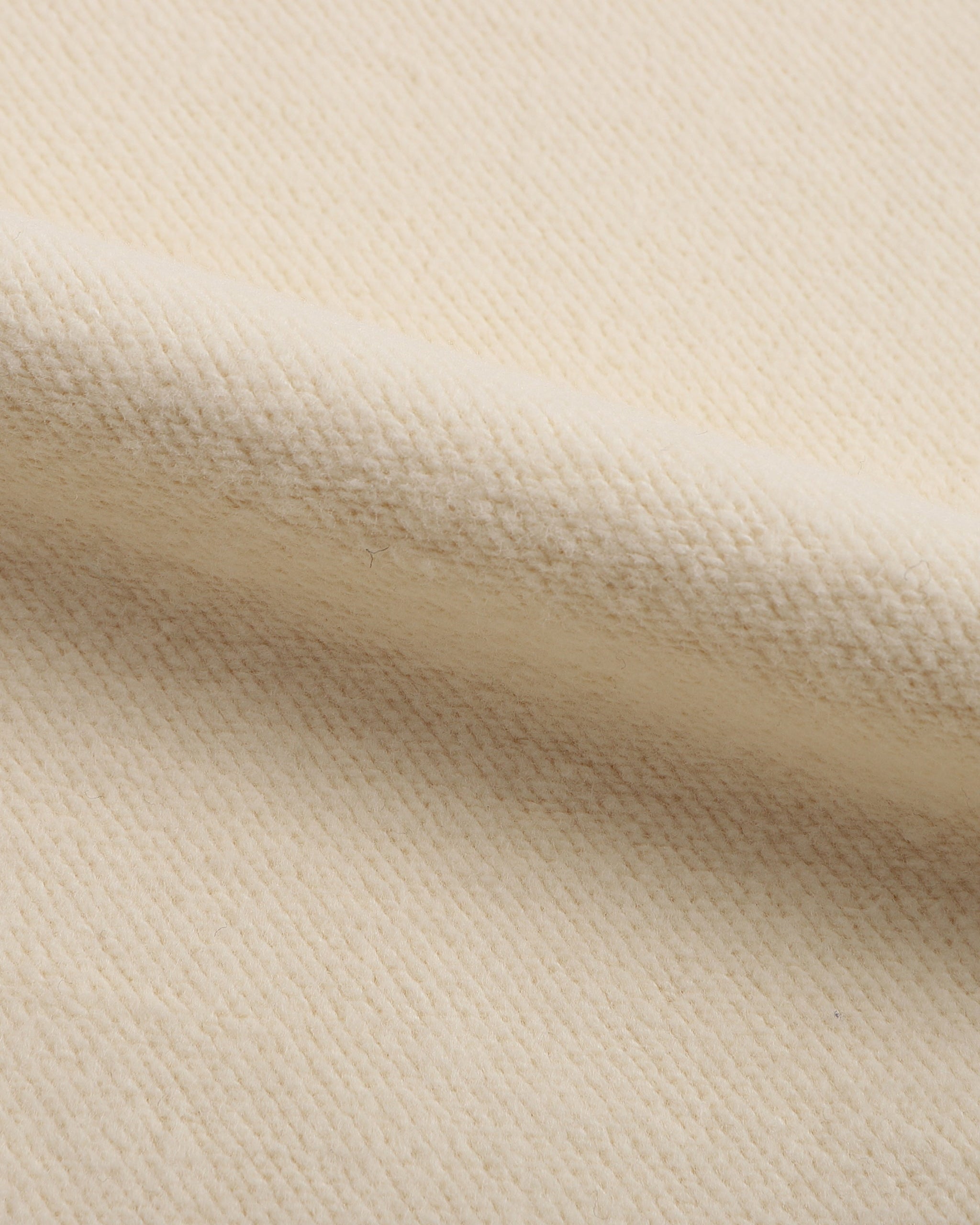 Close-up of beige fabric texture