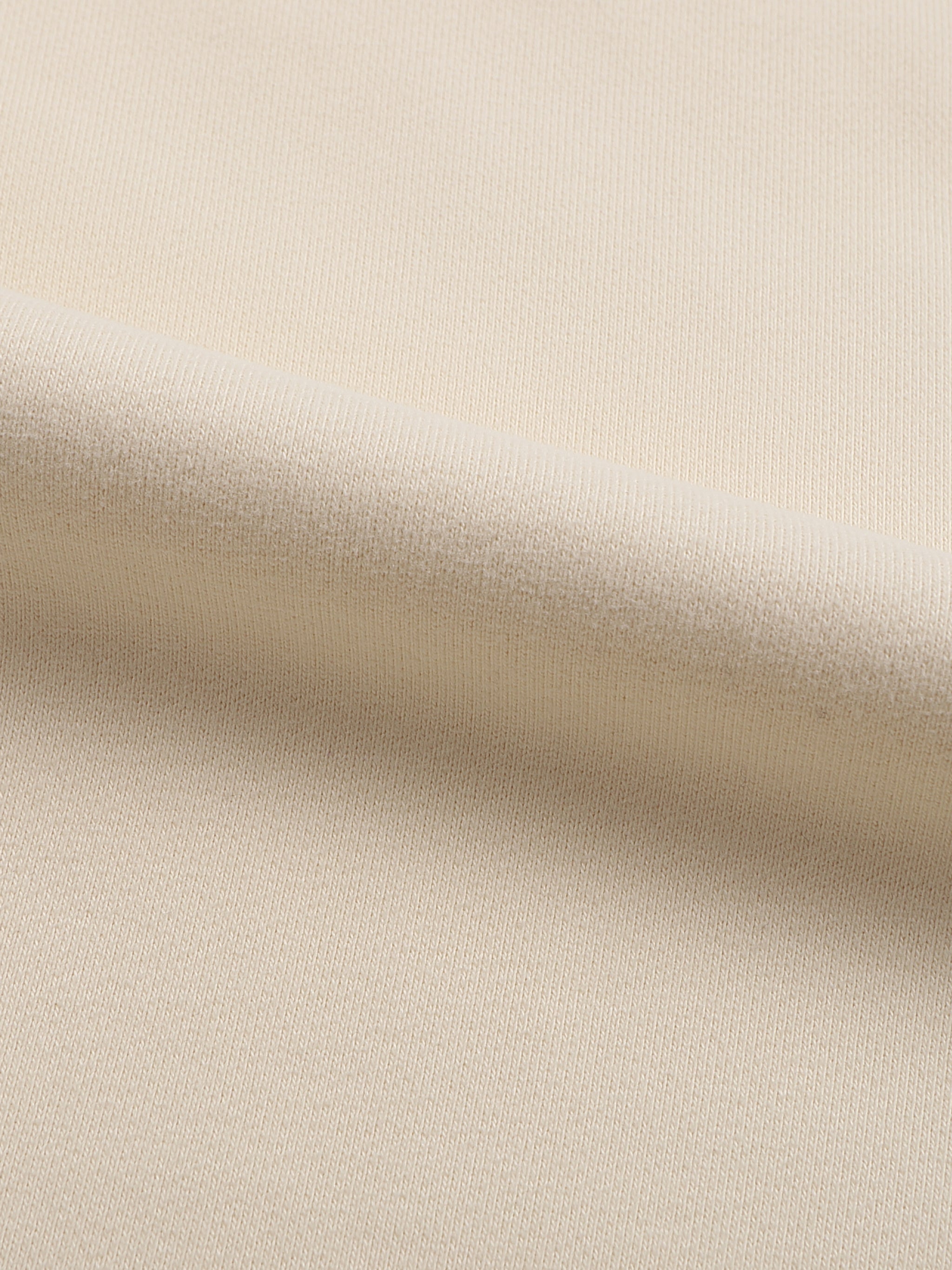 Close-up of beige fabric texture