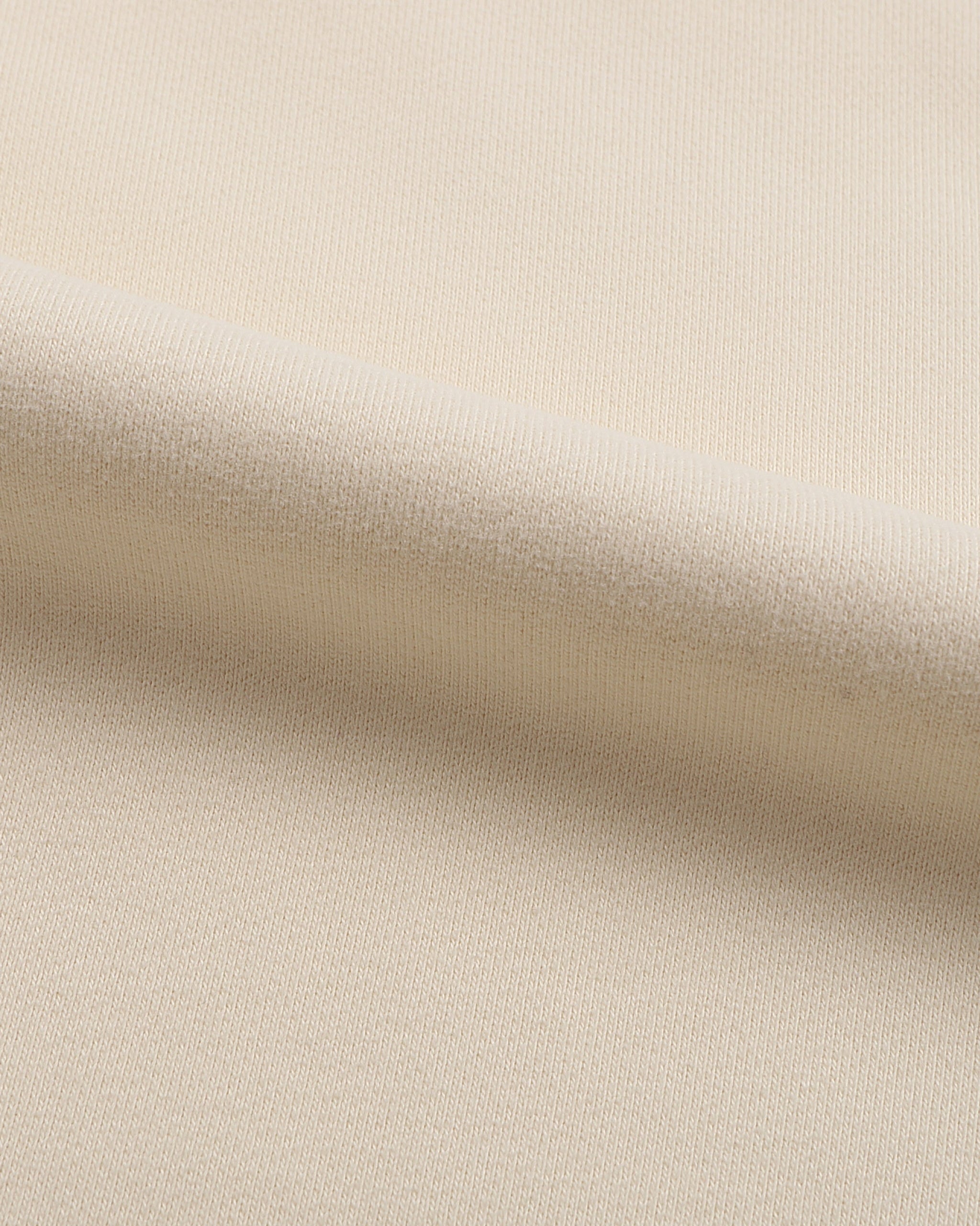 Close-up of beige fabric texture