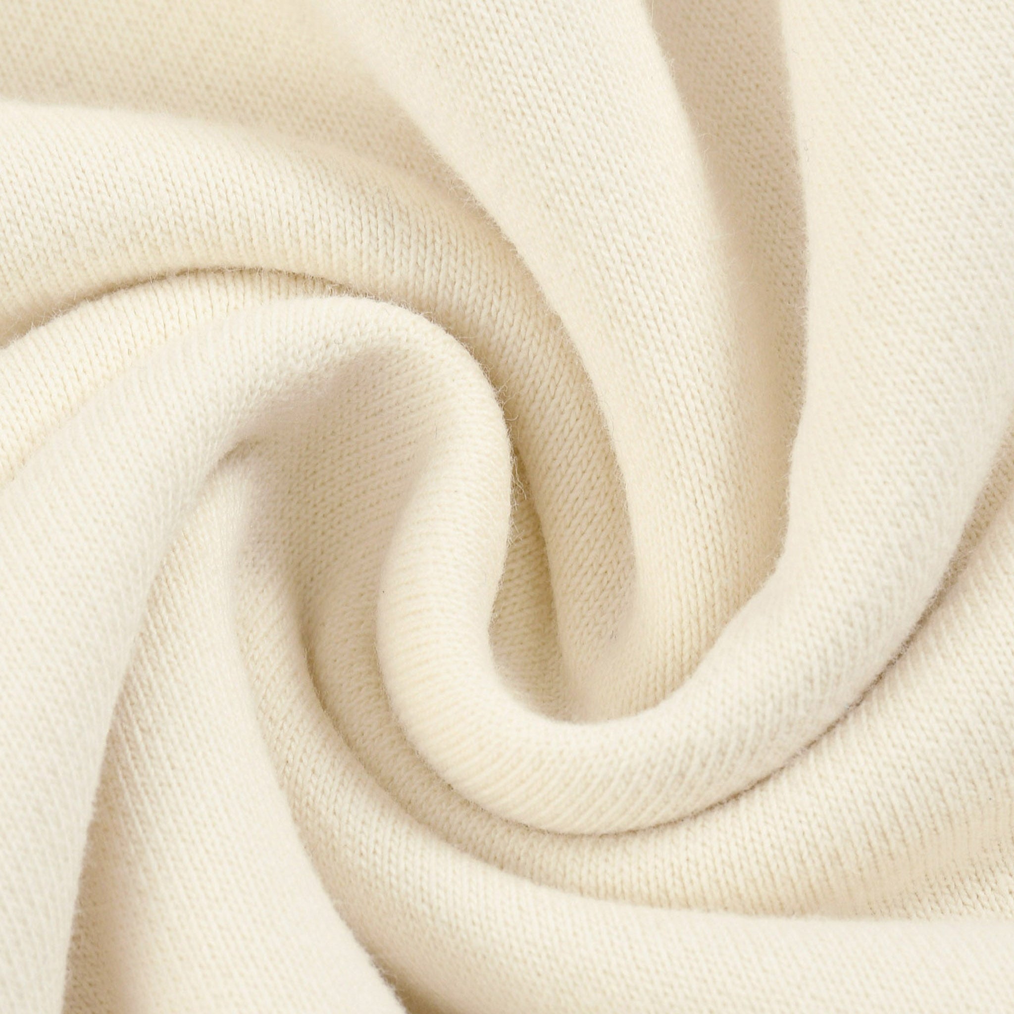 Close-up of beige fabric with a soft texture