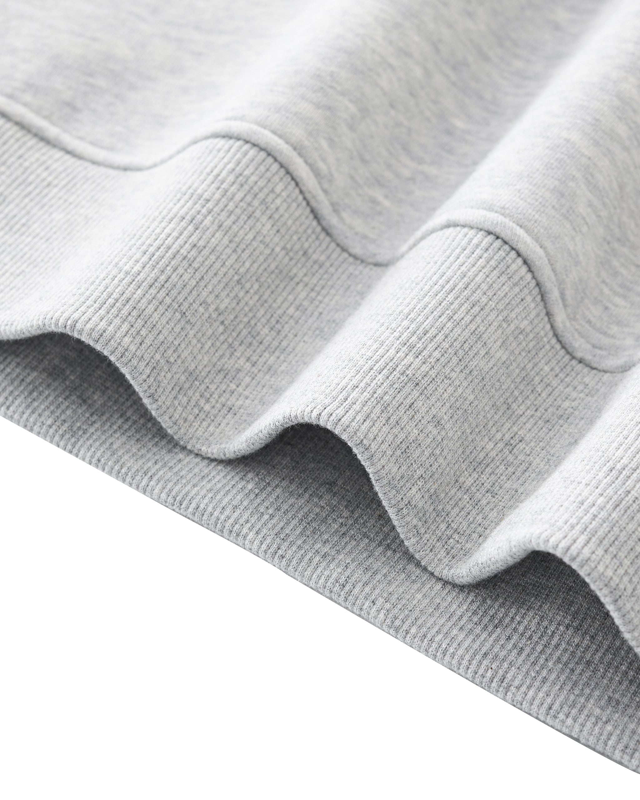 Close-up of gray fabric texture on a white background