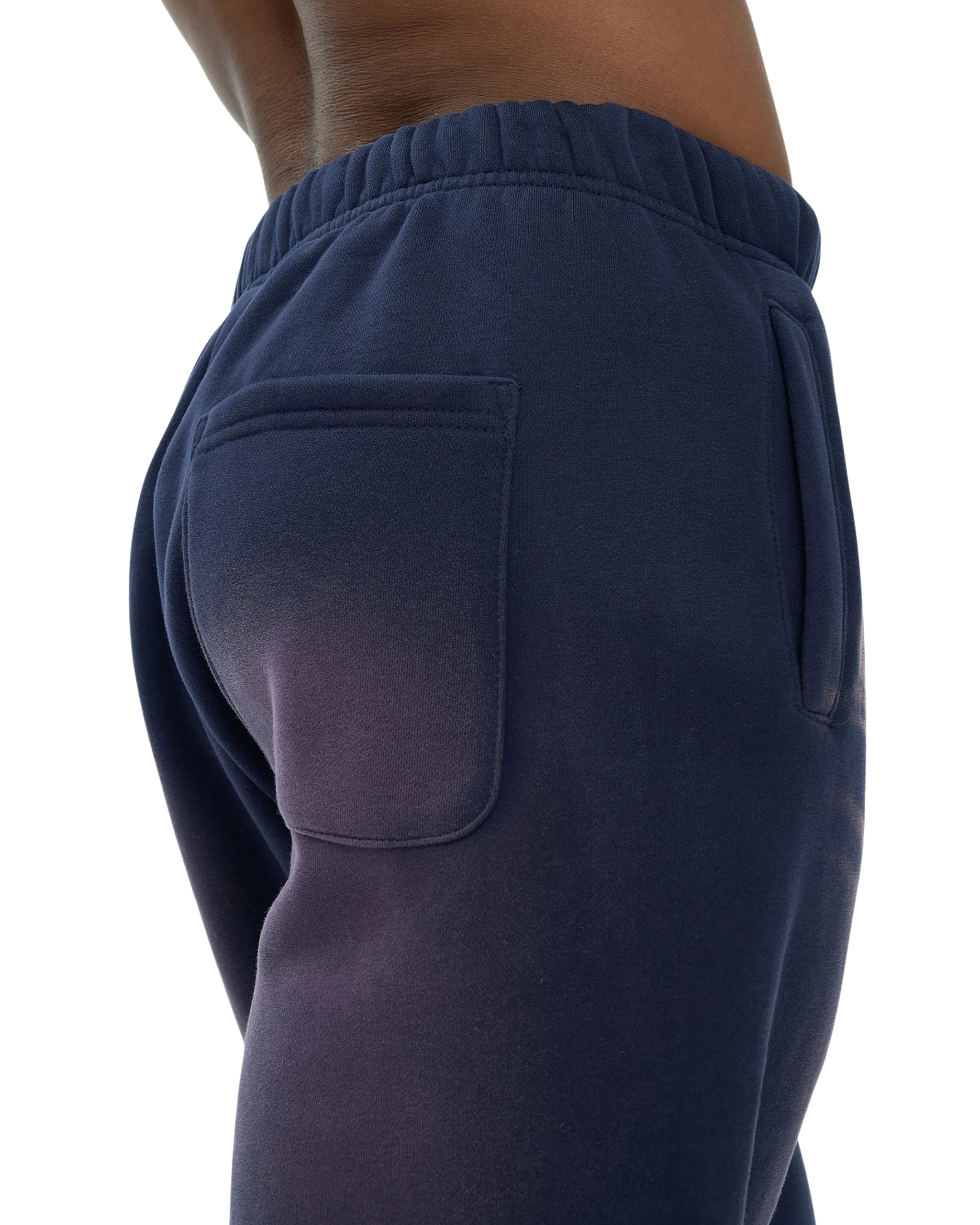 Navy blue sweatpants with a pocket on a white background