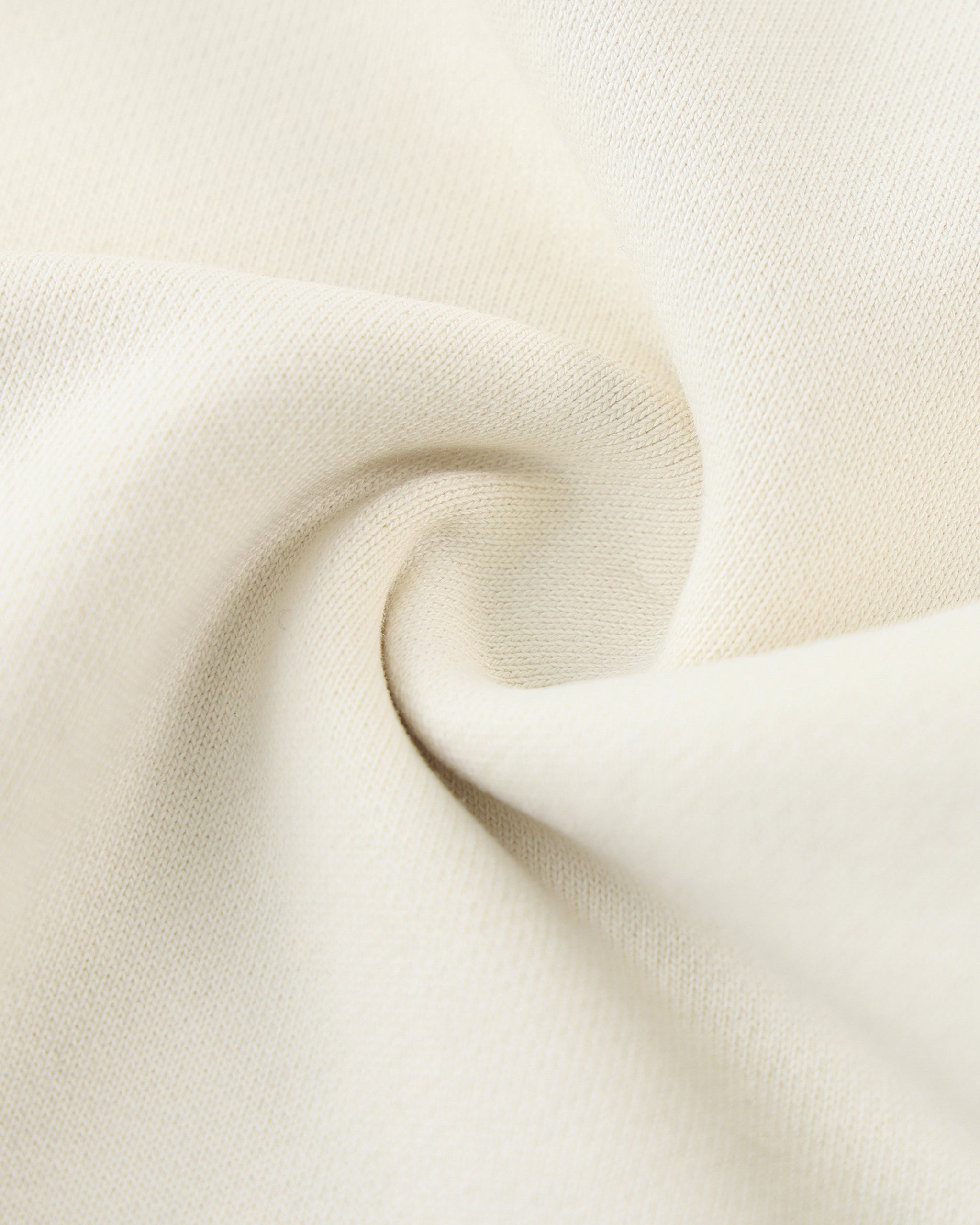 Close-up of beige fabric with a soft texture