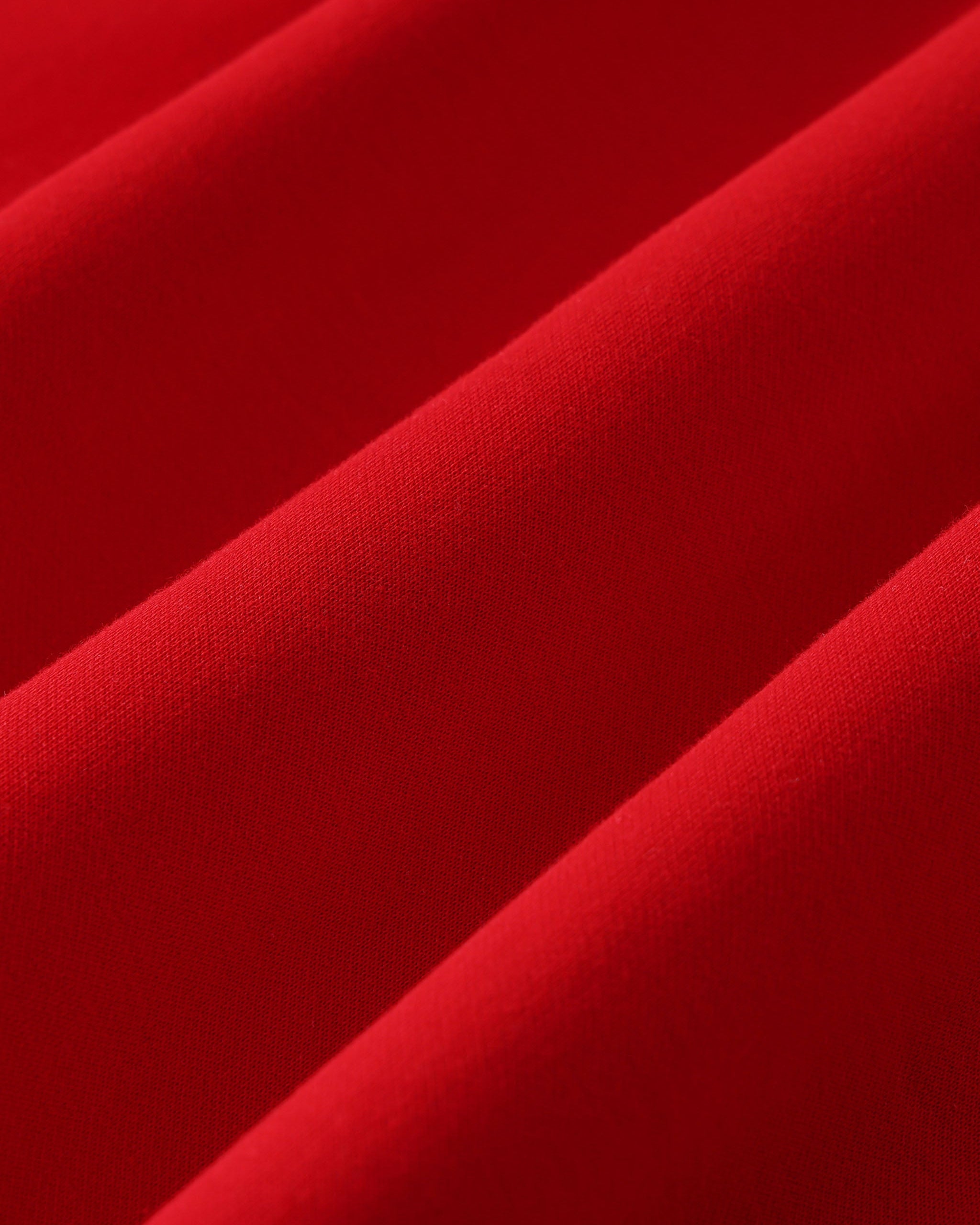 Close-up of red fabric with folds