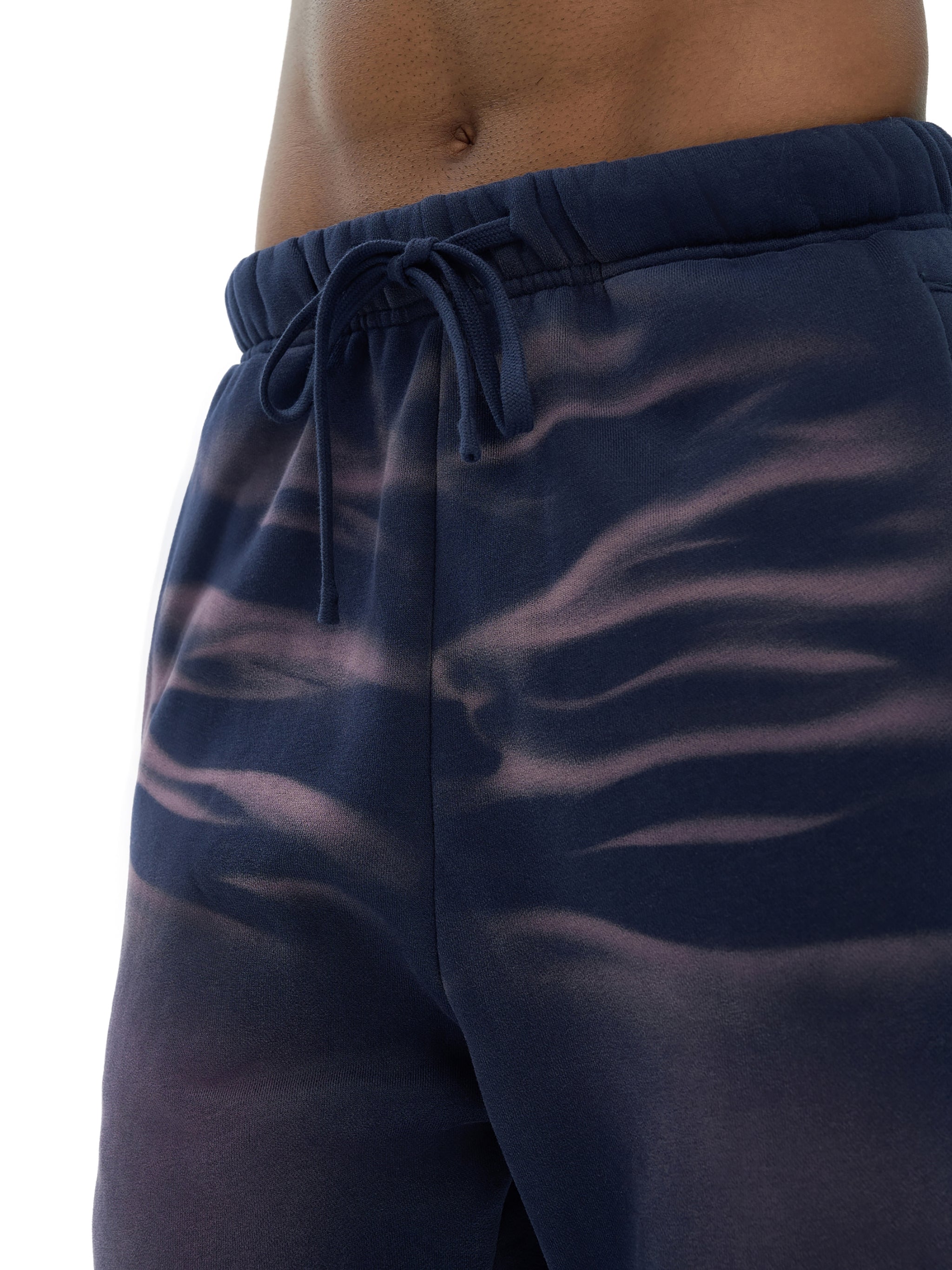 Navy blue shorts with a subtle pattern on a white background