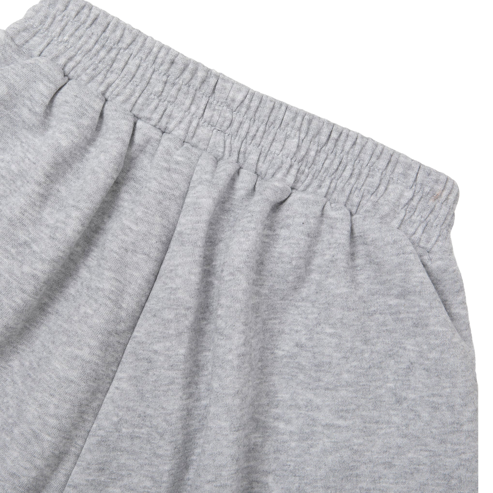 Close-up of gray sweatpants on a white background