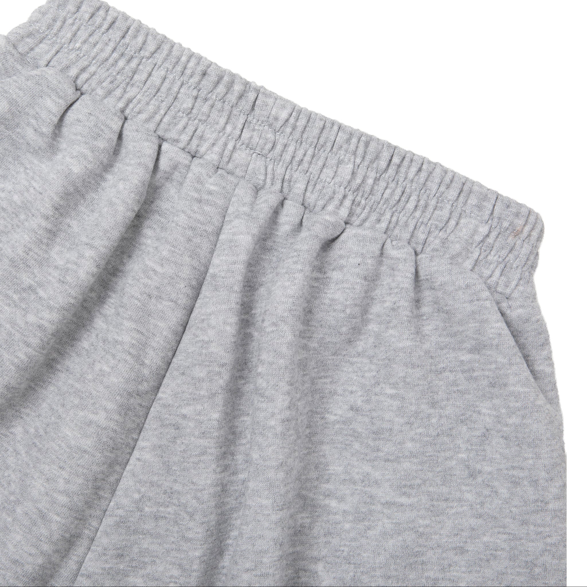 Close-up of gray sweatpants on a white background