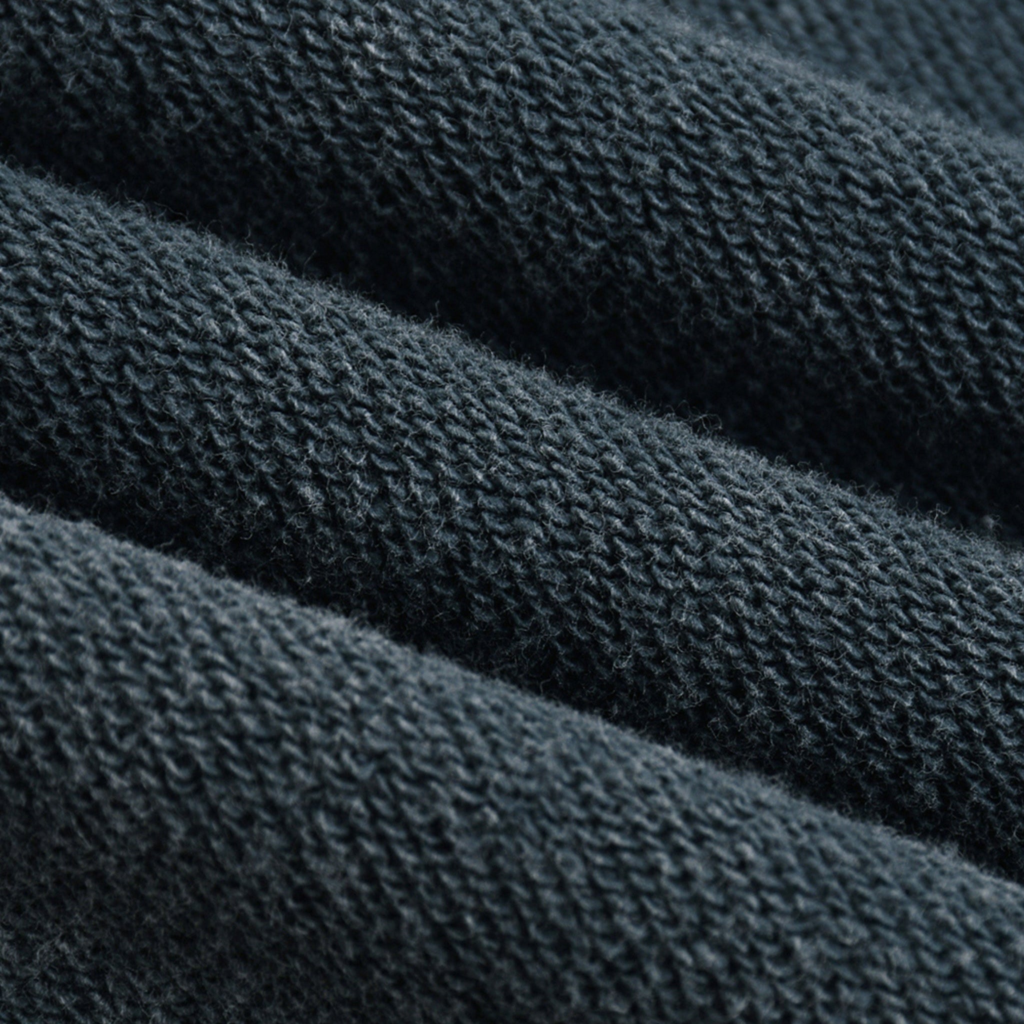 Close-up of dark blue fabric texture