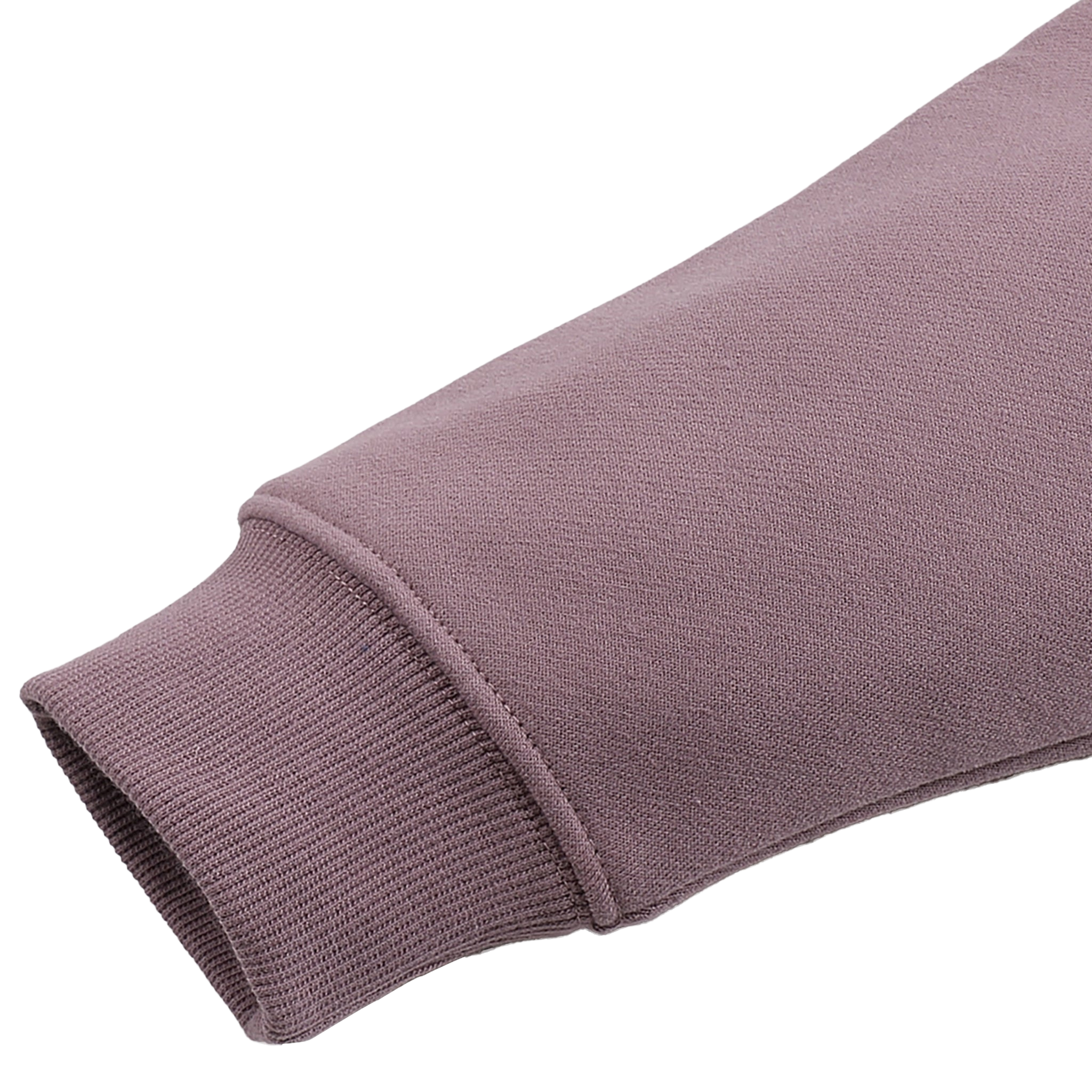 Close-up of a purple sweater sleeve on a white background