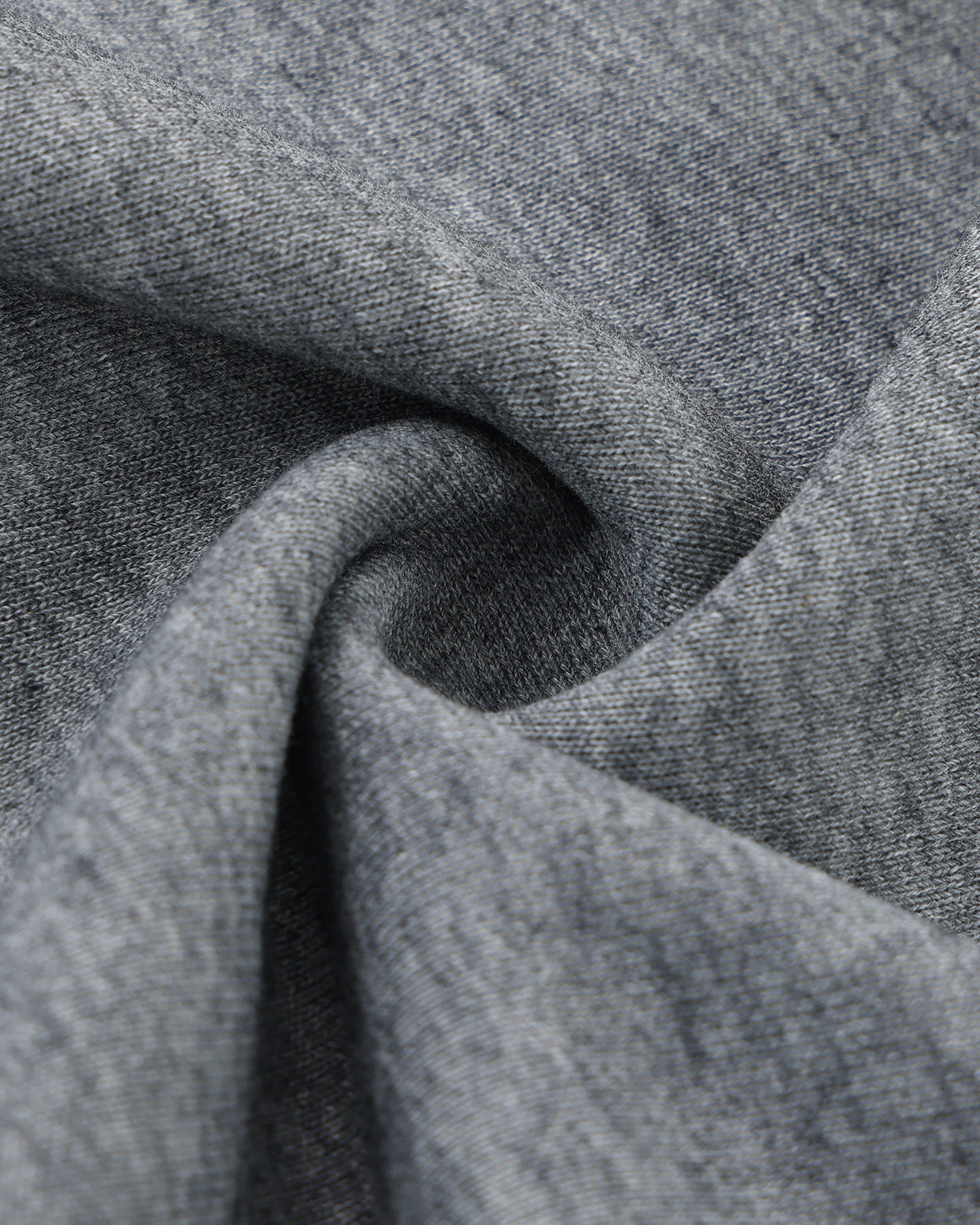 Close-up of gray fabric with a textured pattern