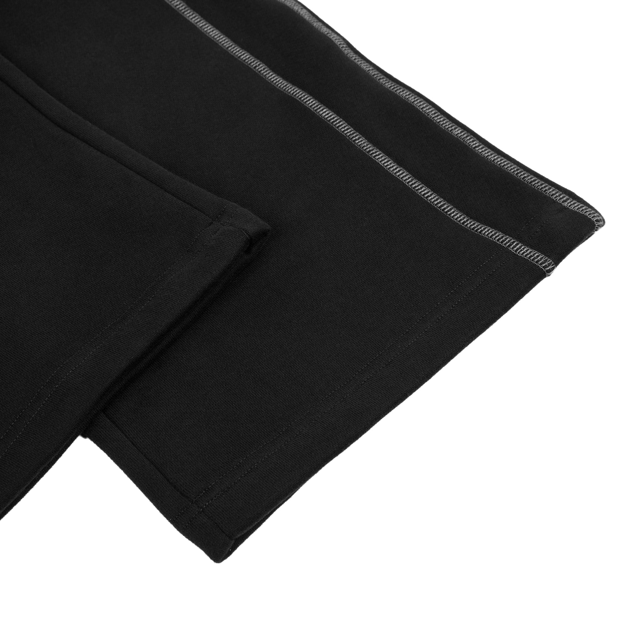 Close-up of black fabric with a white background