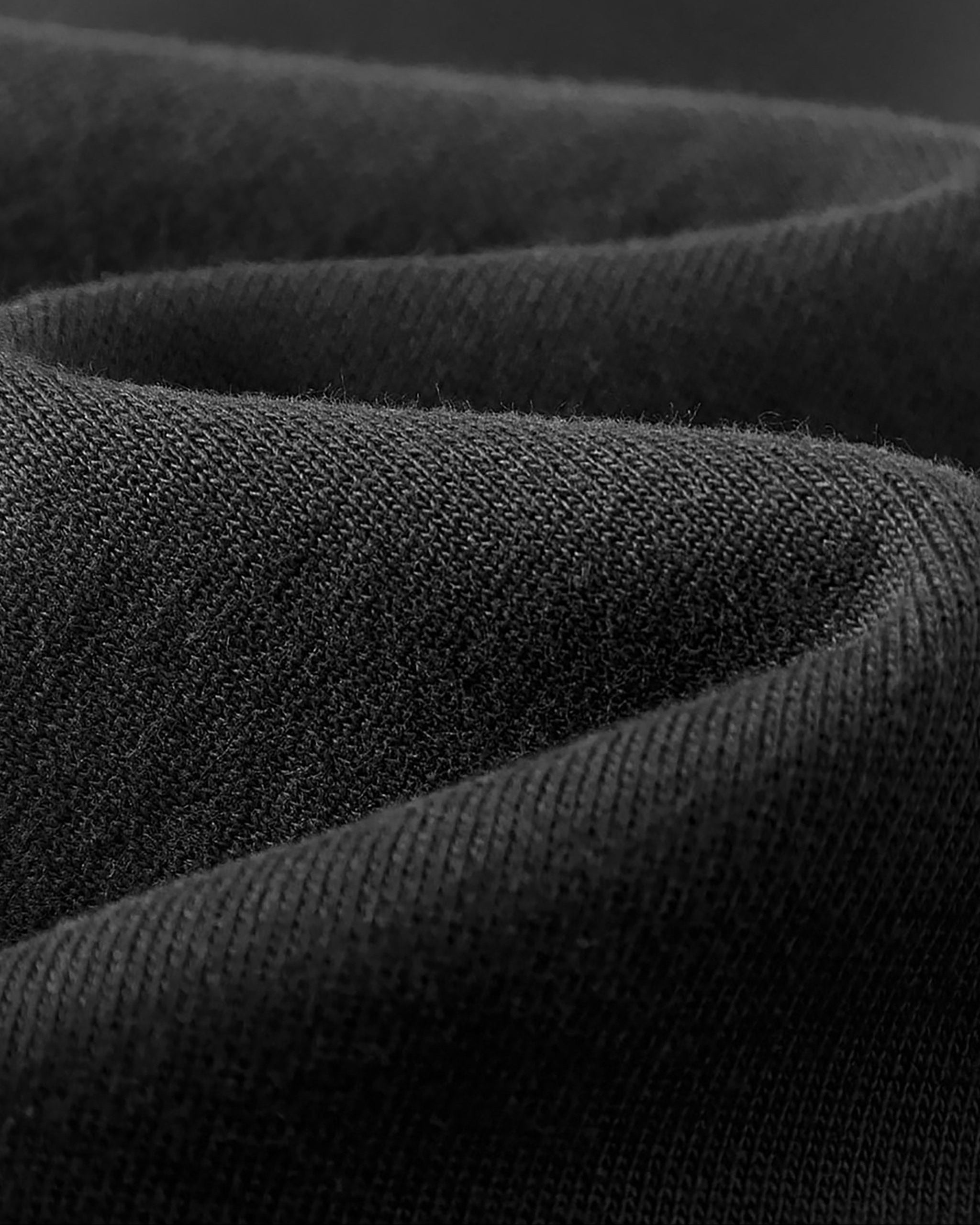 Close-up of Black fabric with a textured pattern