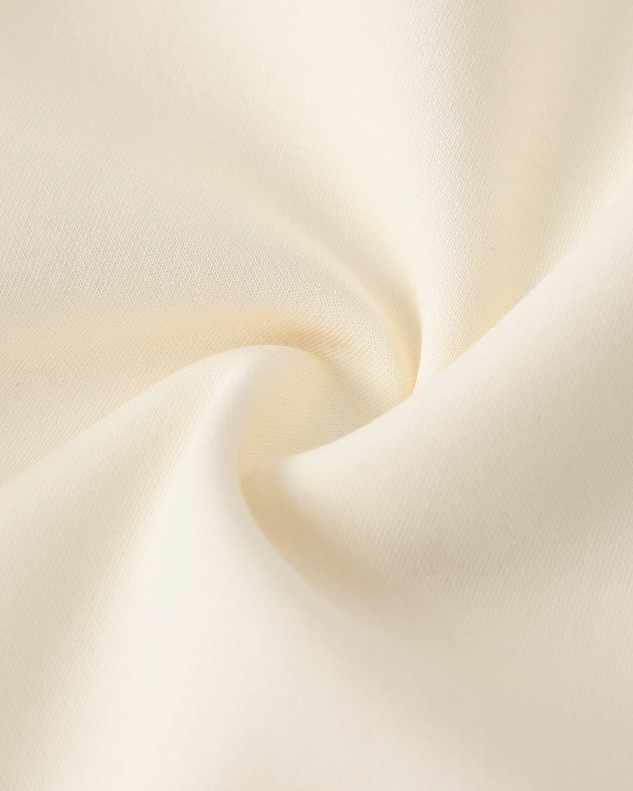Close-up of beige fabric with a soft texture