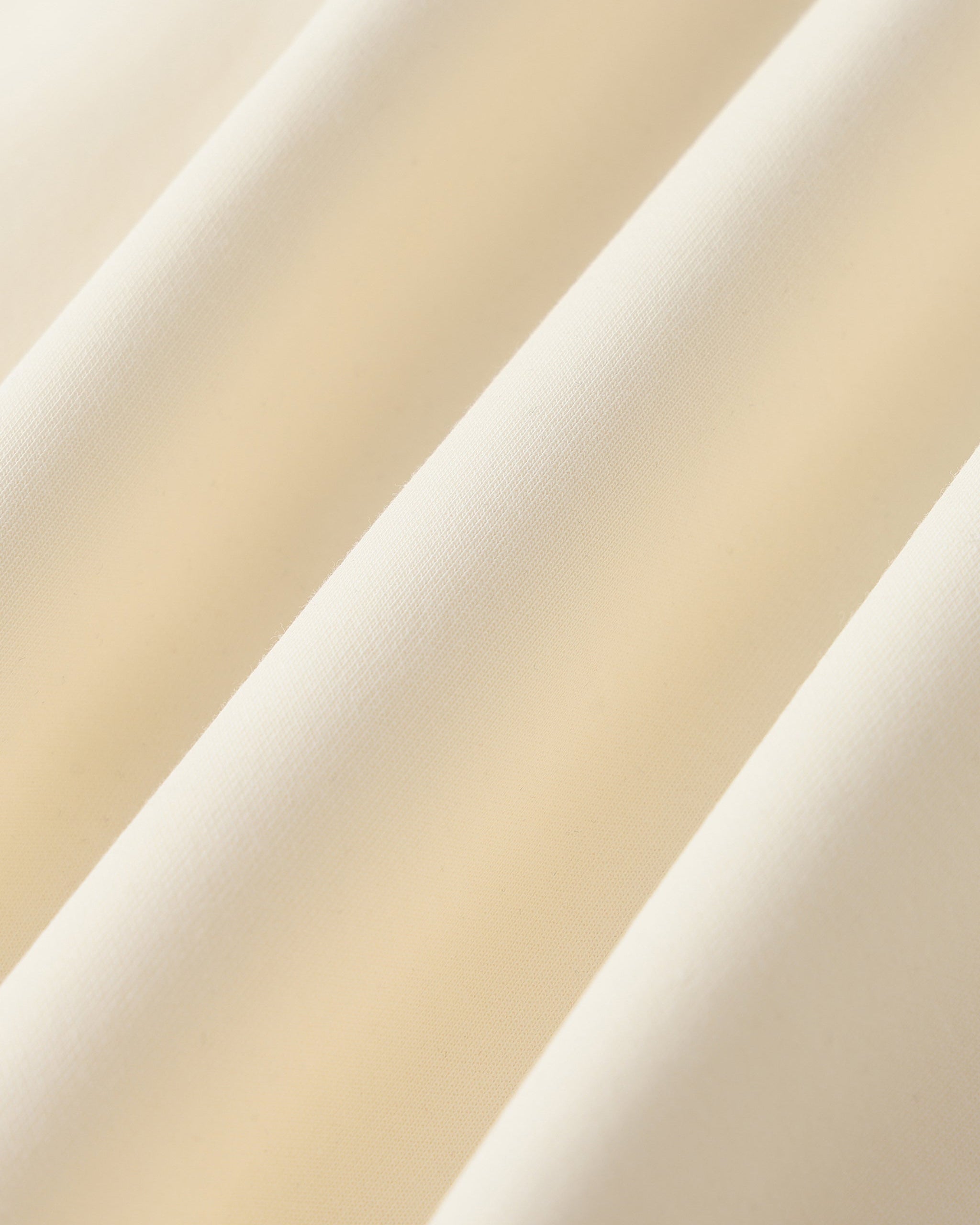 Close-up of beige fabric swatches with different textures