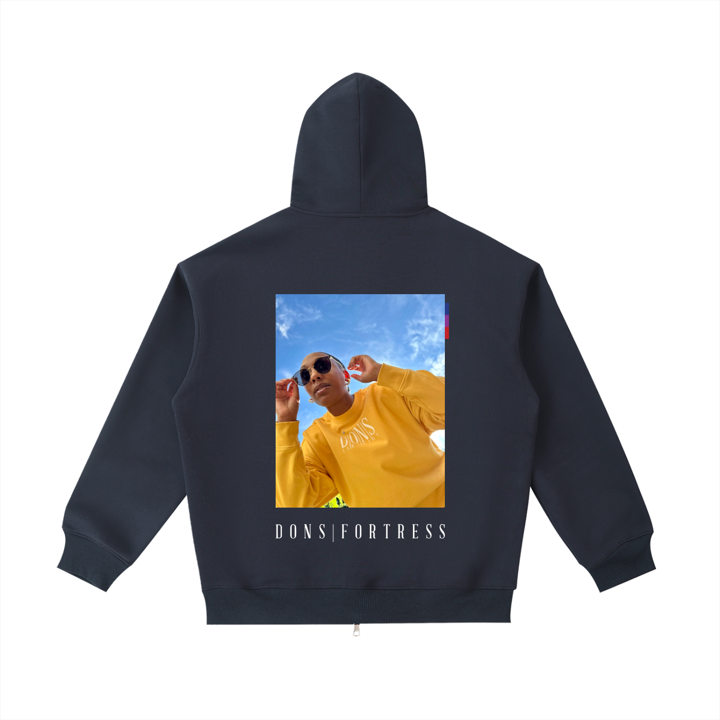 Black hoodie with a printed design on the back featuring a person in a yellow shirt and sunglasses against a blue sky.