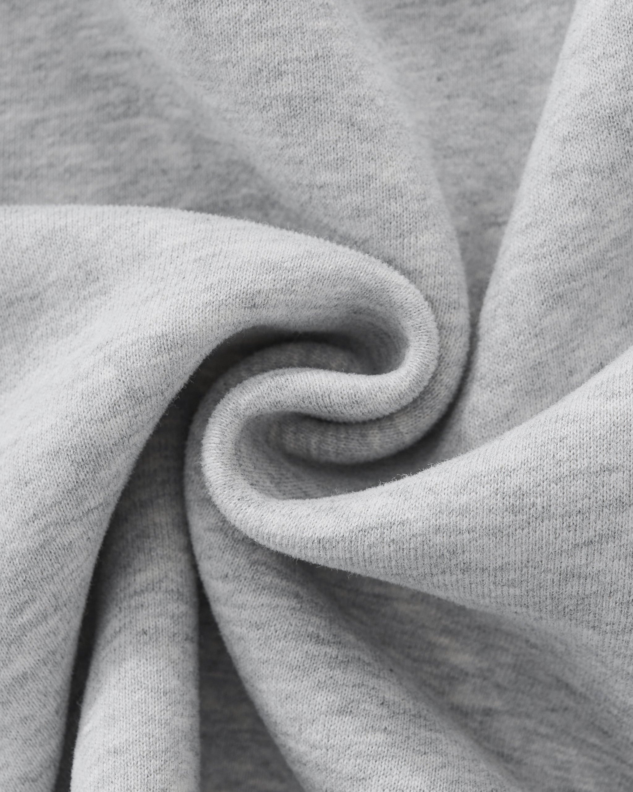 Close-up of gray fabric with a swirl pattern