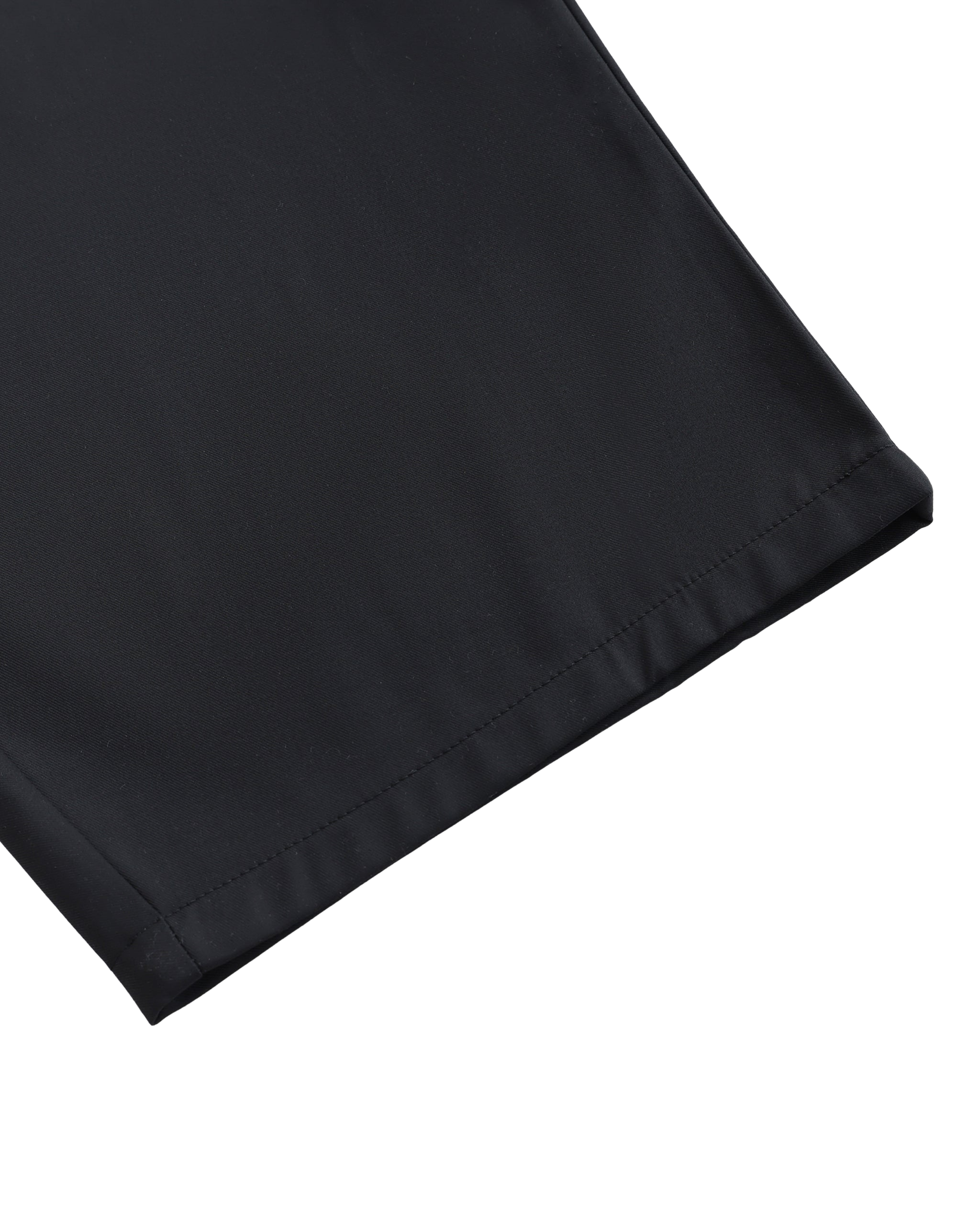Close-up of a black fabric corner on a white background