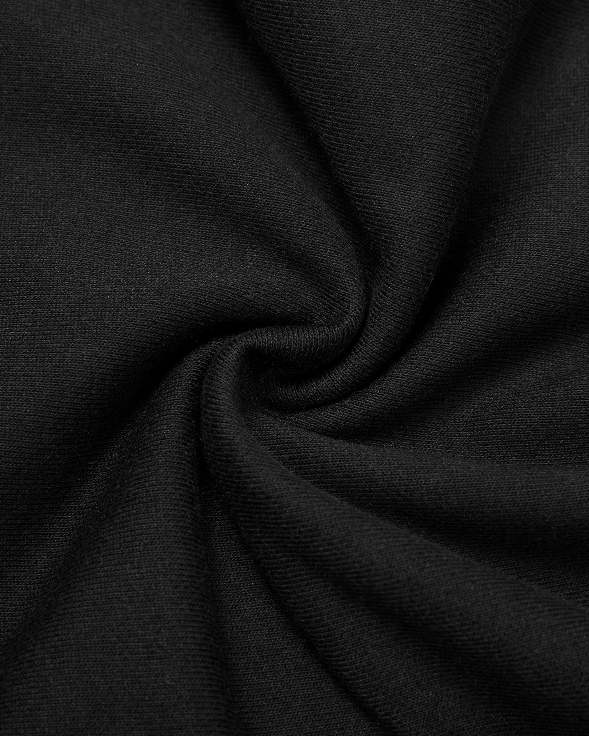 Close-up of black fabric with folds