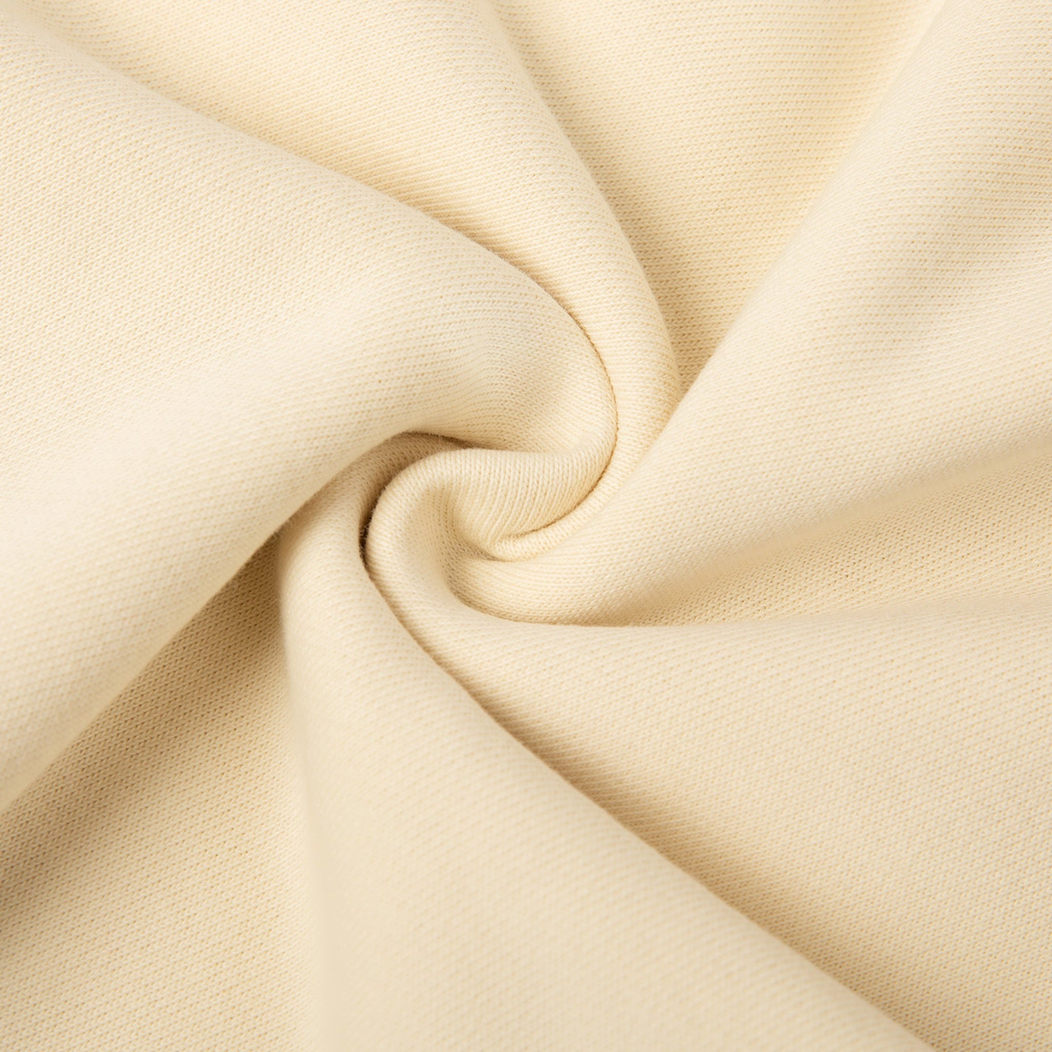 Close-up of beige fabric with folds