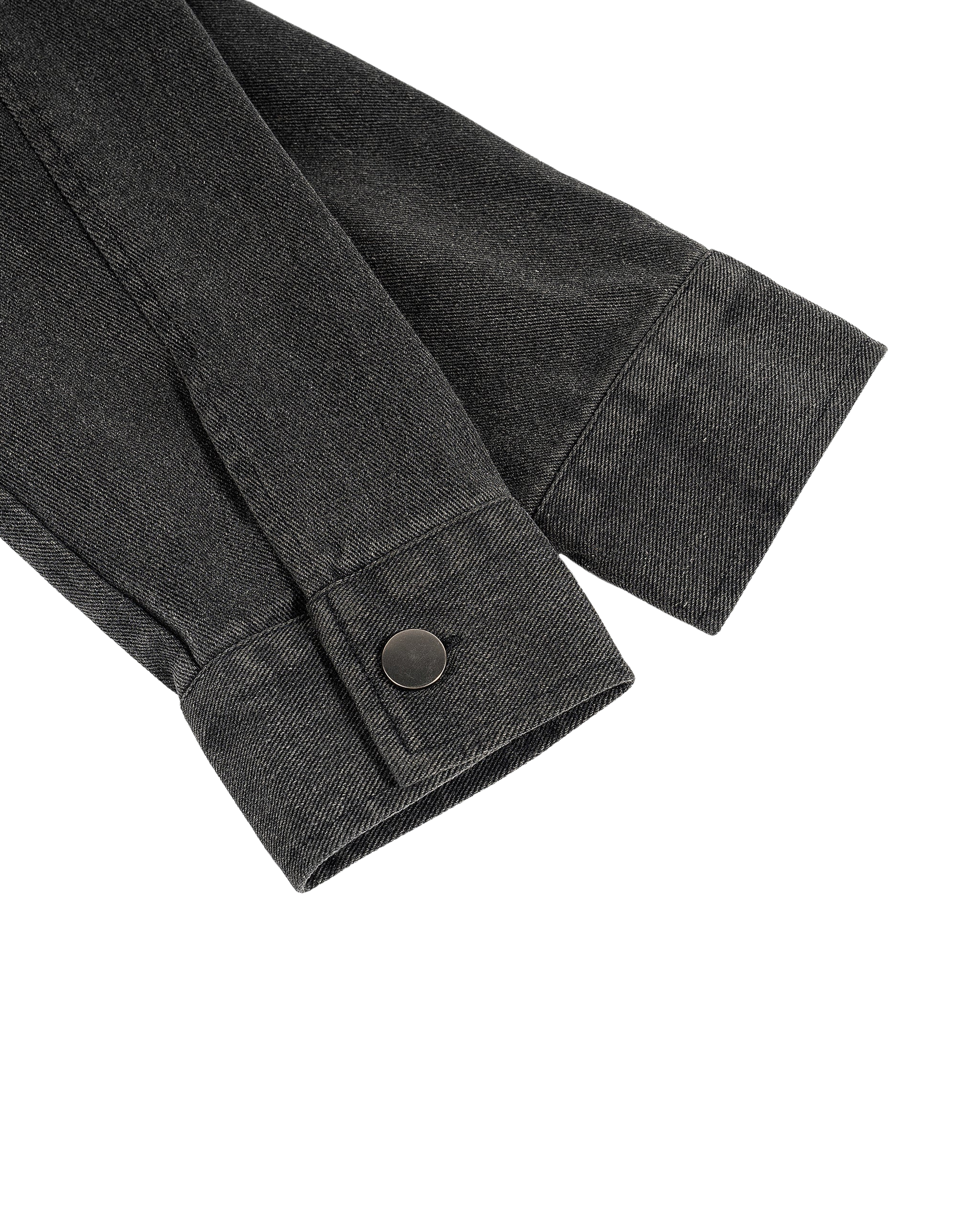 Close-up of a dark gray jacket with a button on a white background