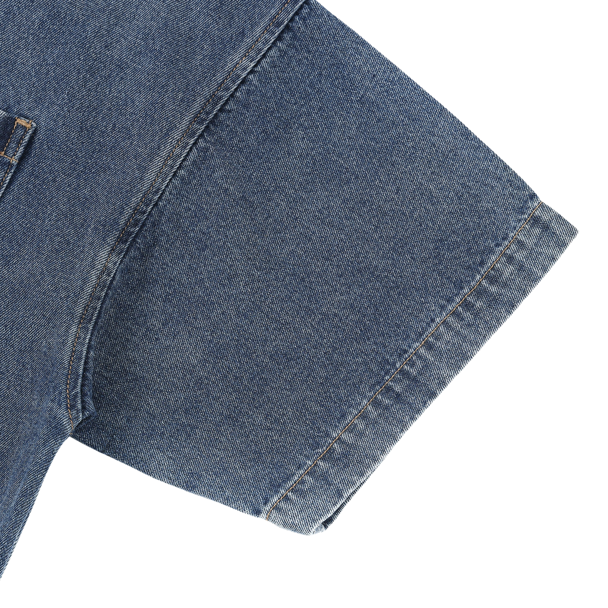 Close-up of blue denim shorts on a white background