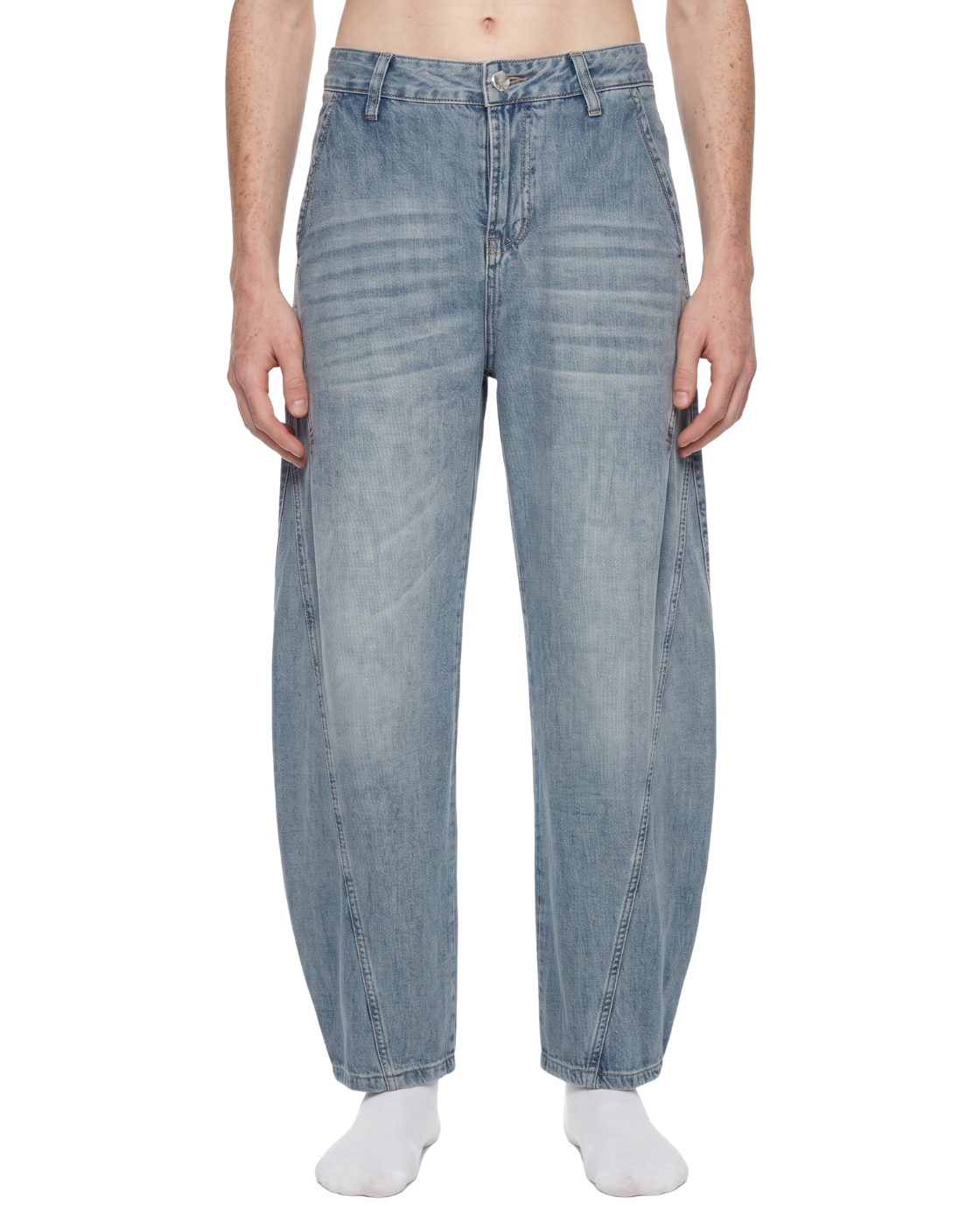 Light blue jeans worn by a person on a white background