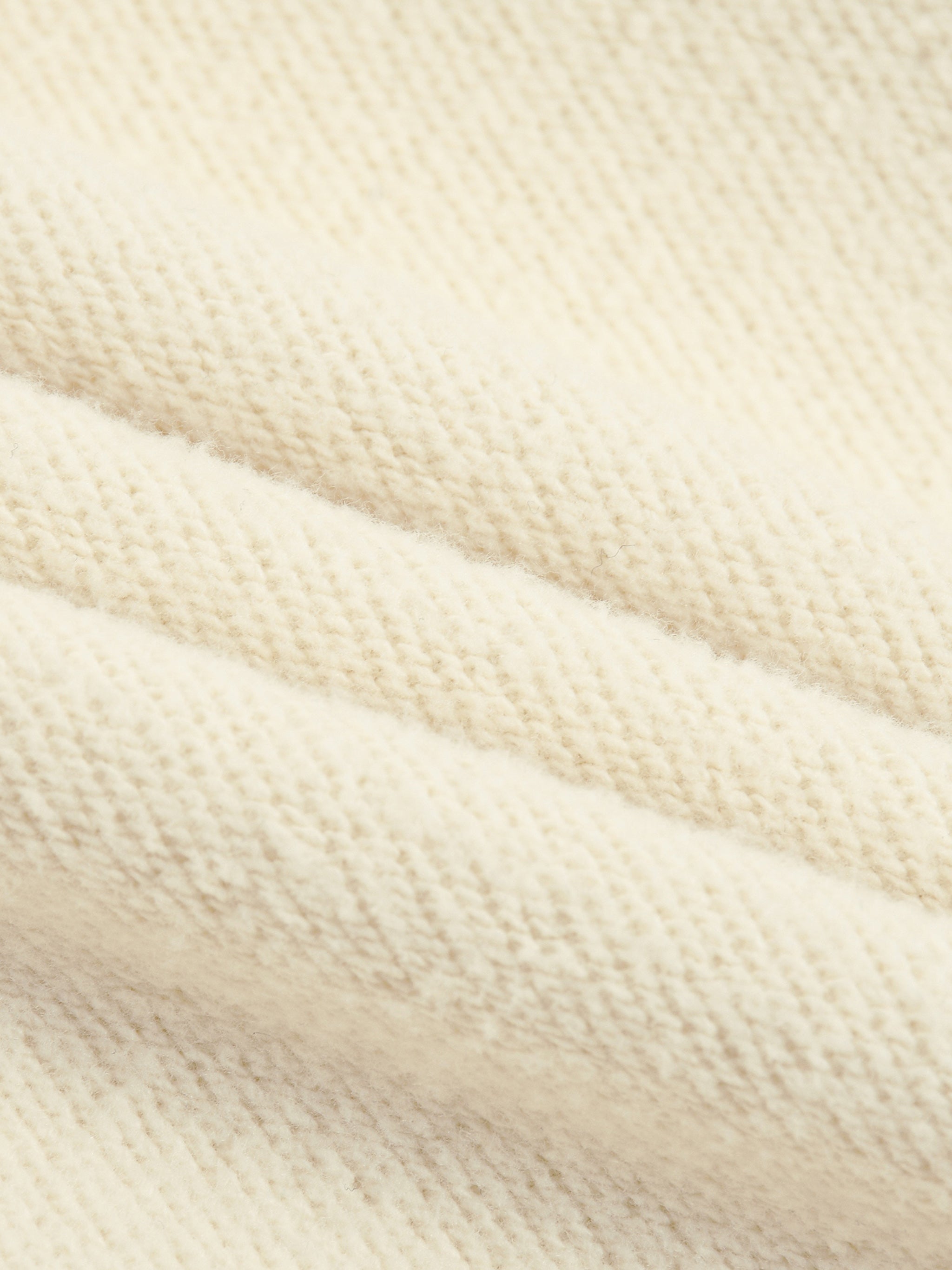 Close-up of beige fabric texture