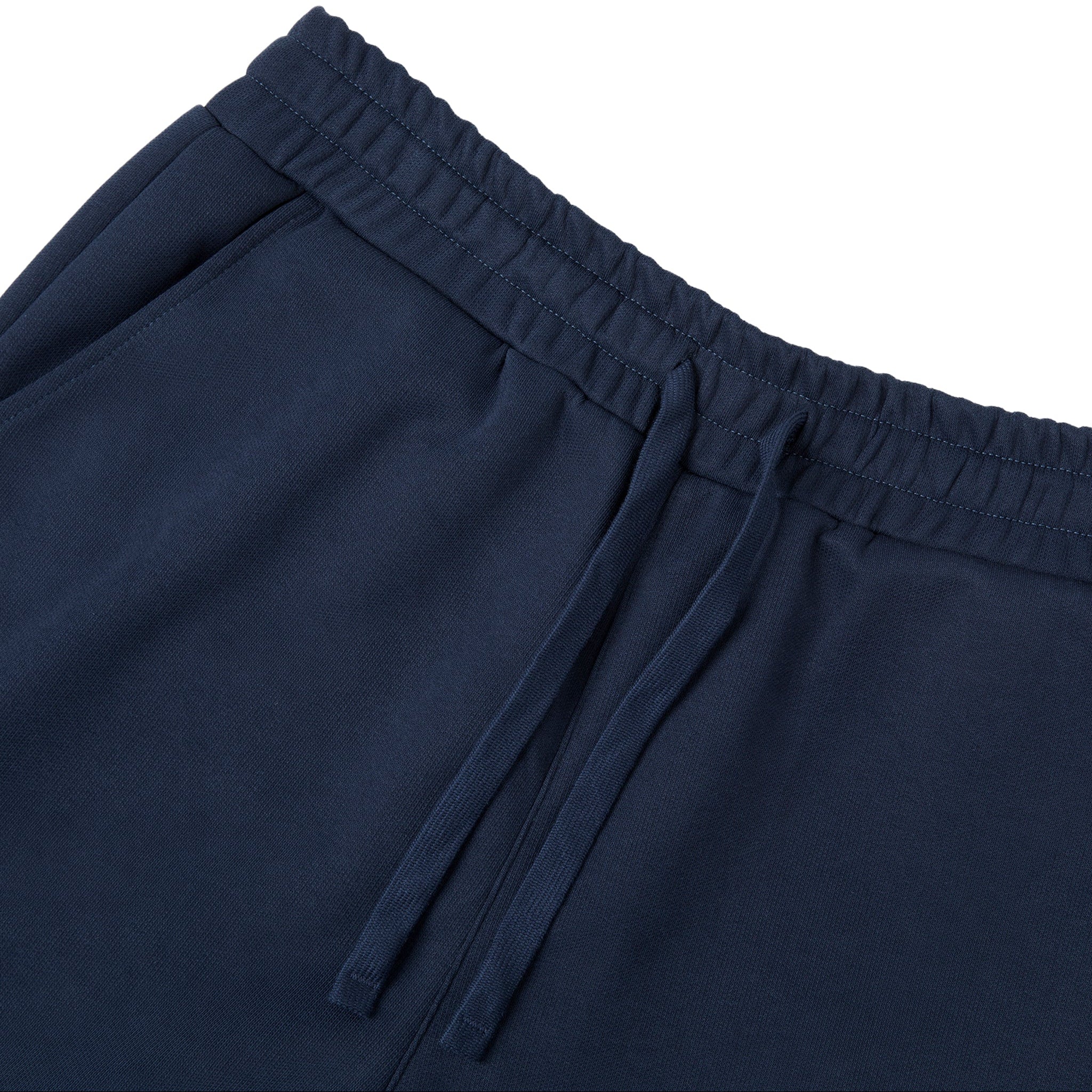Navy blue pants with an elastic waistband on a white background
