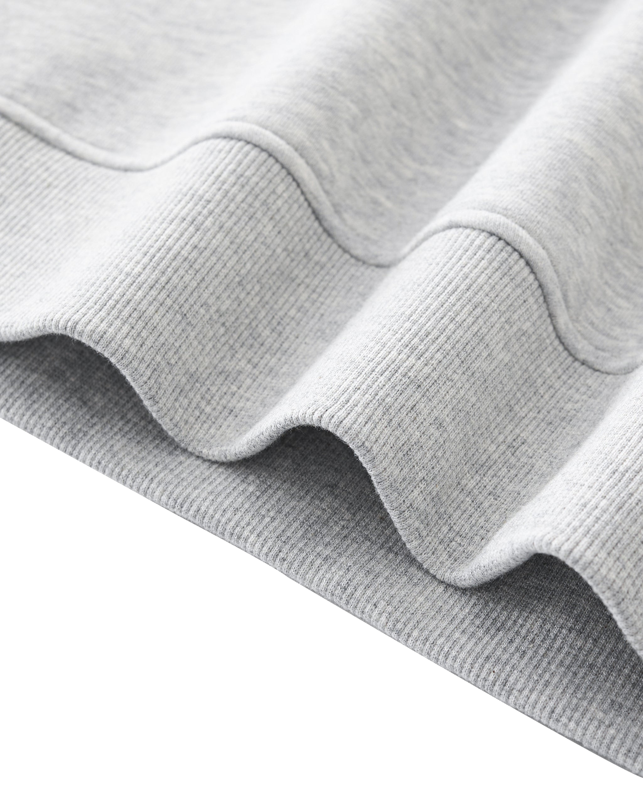 Close-up of gray fabric texture on a white background