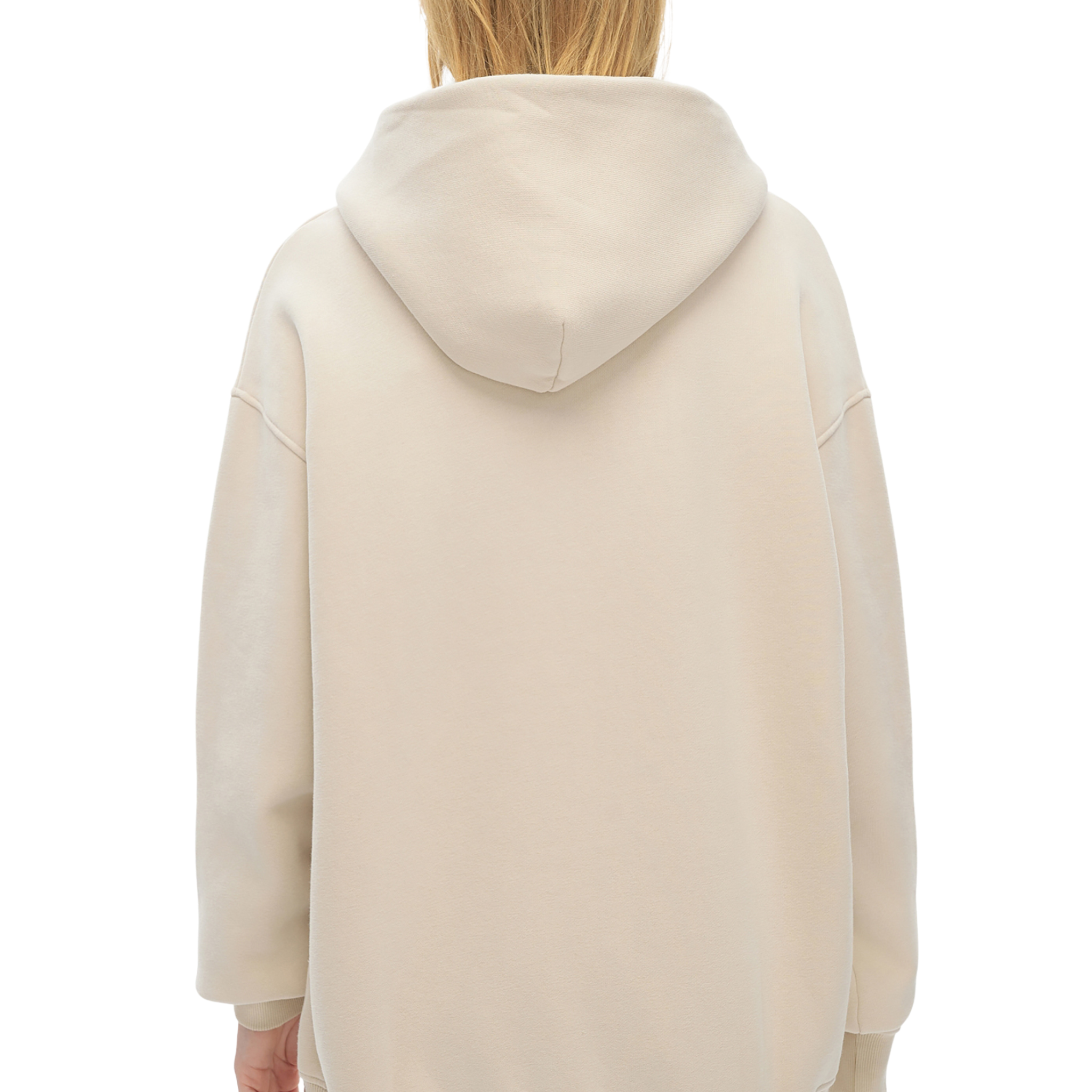 Person wearing a beige hoodie and pants on a white background