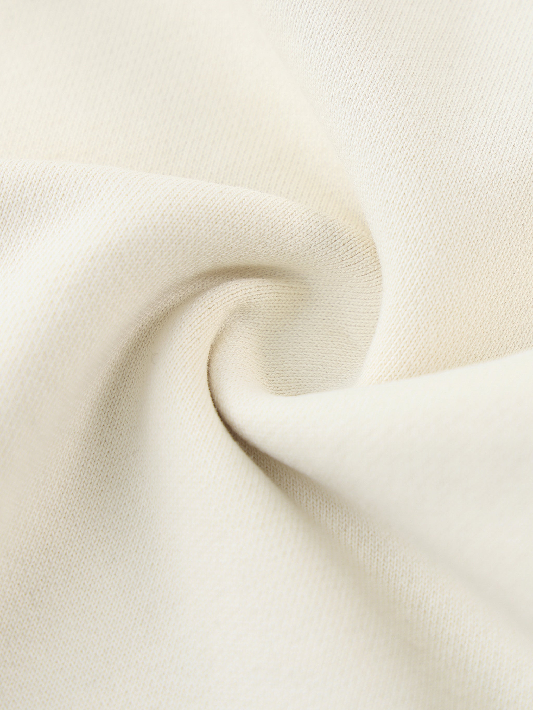 Close-up of beige fabric with a soft texture