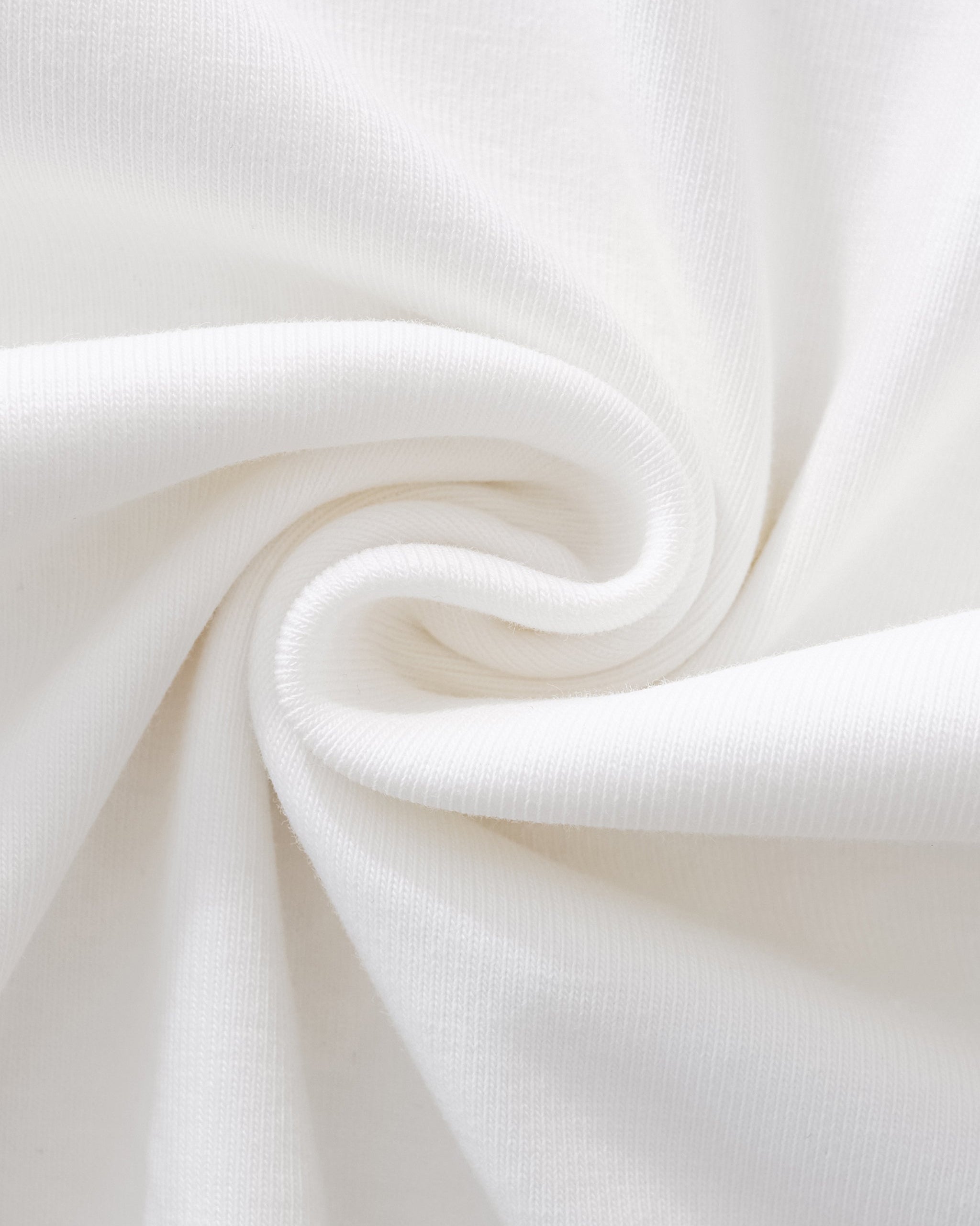 Close-up of white fabric with a subtle texture