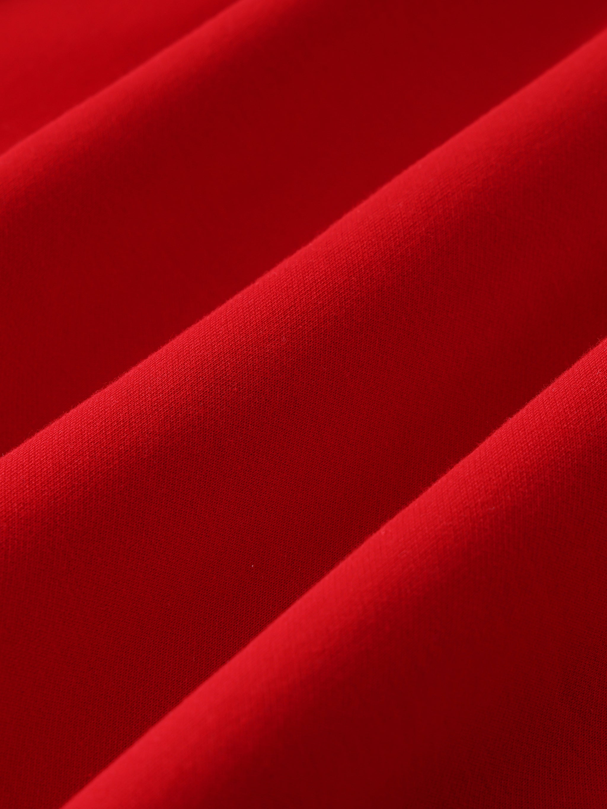 Close-up of red fabric with folds