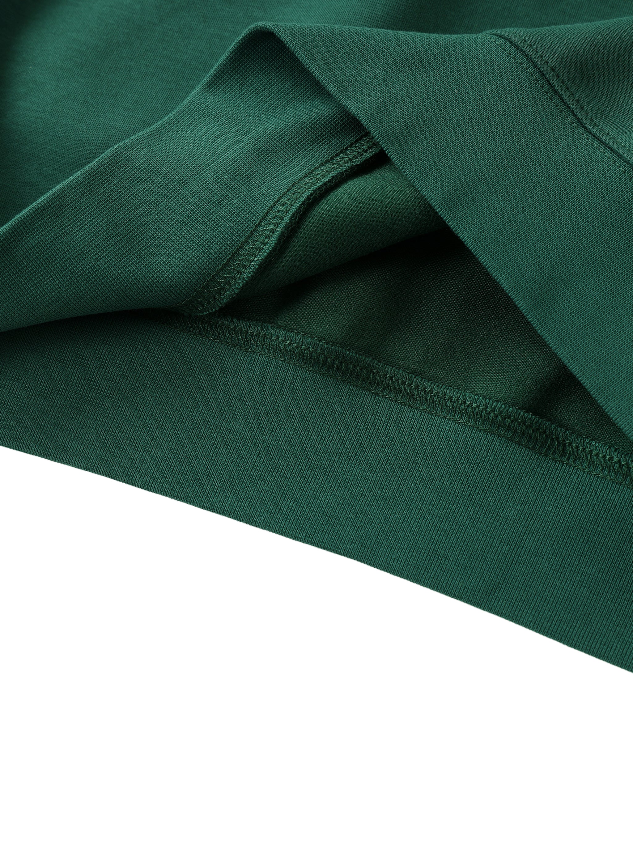 Close-up of green fabric with a white background