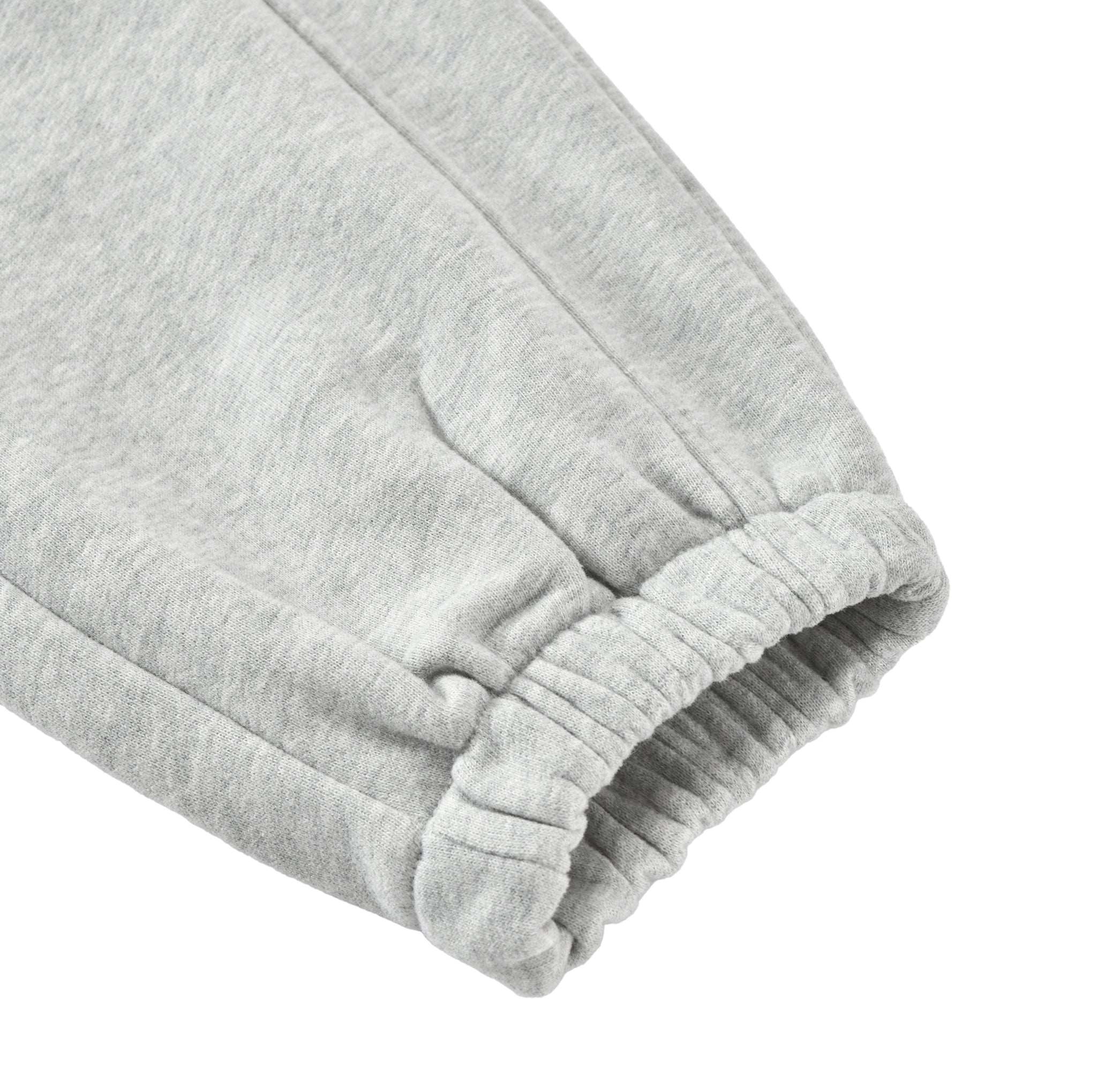 Close-up of a gray fleece blanket on a white background