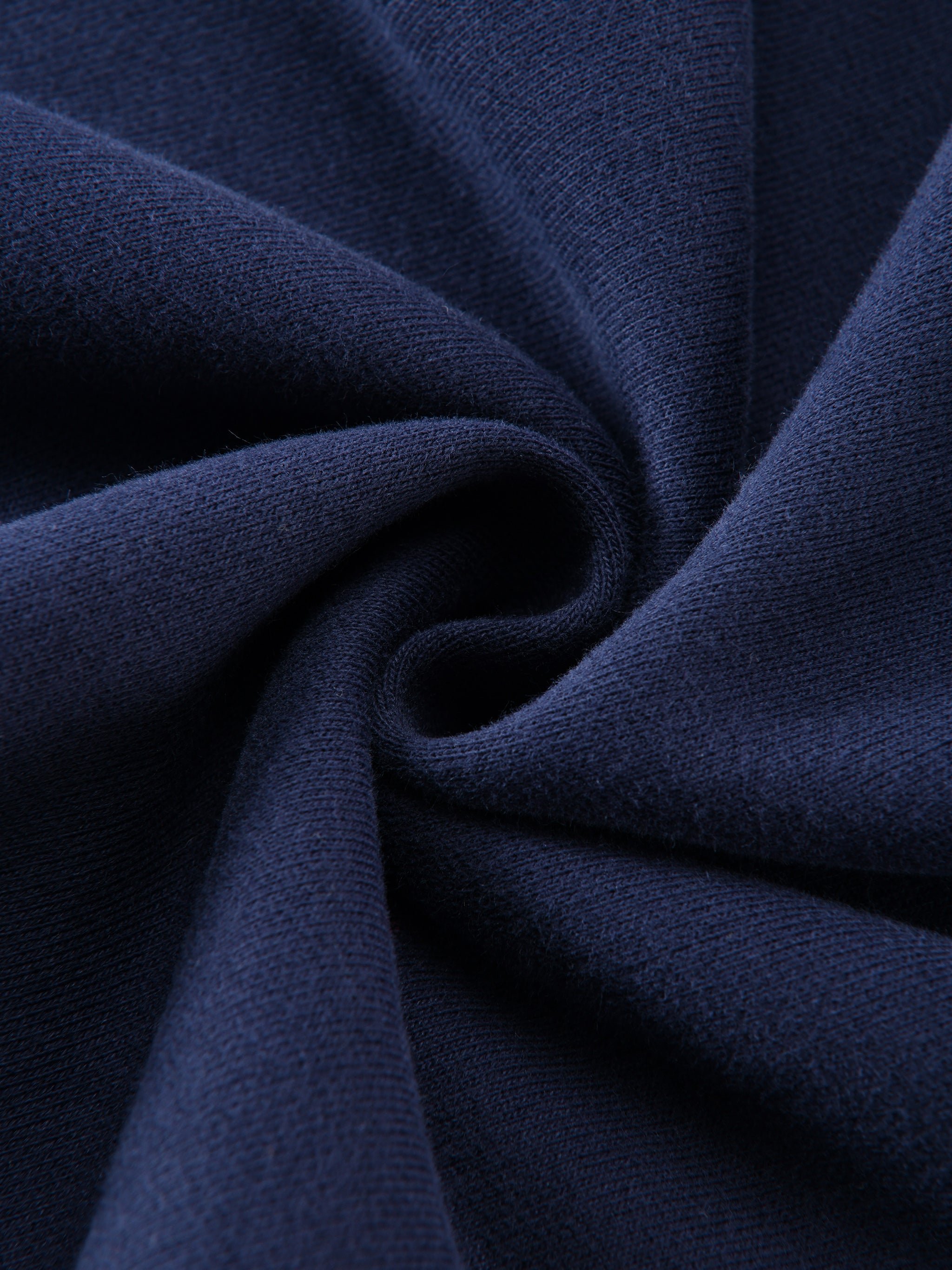Close-up of dark blue fabric with folds