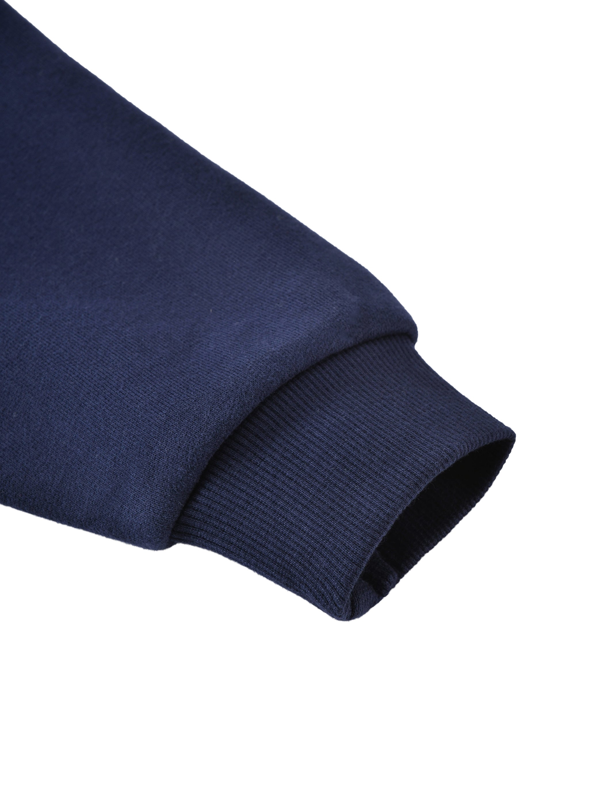 Close-up of a navy blue fabric roll on a white background