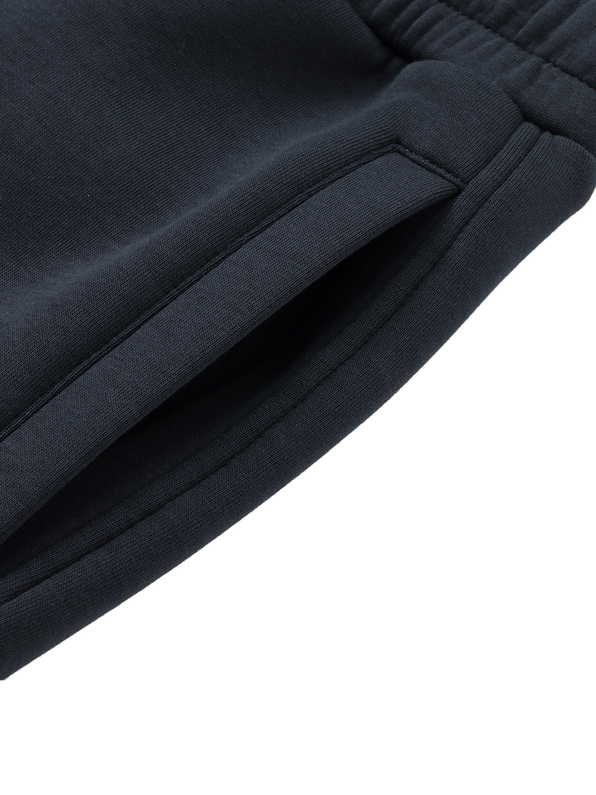 Close-up of dark blue fabric with a white background