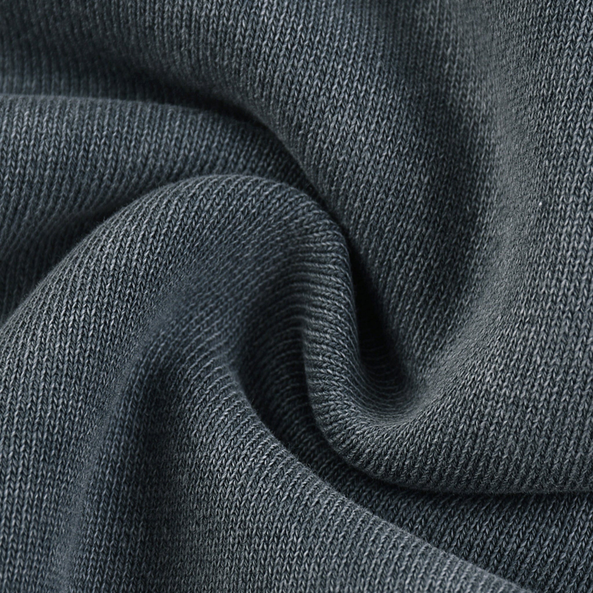 Close-up of dark gray fabric with visible texture