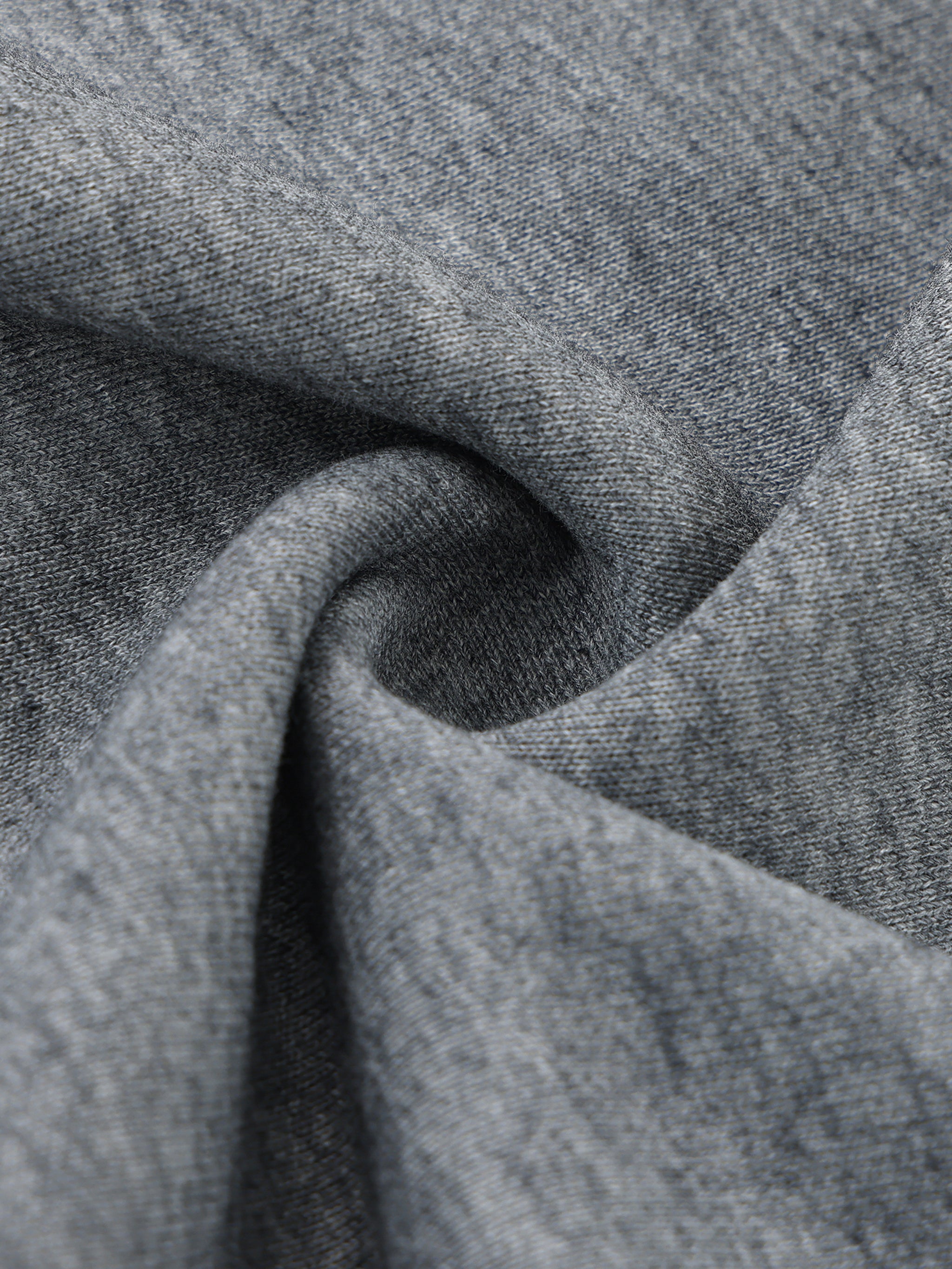 Close-up of gray fabric with a textured pattern
