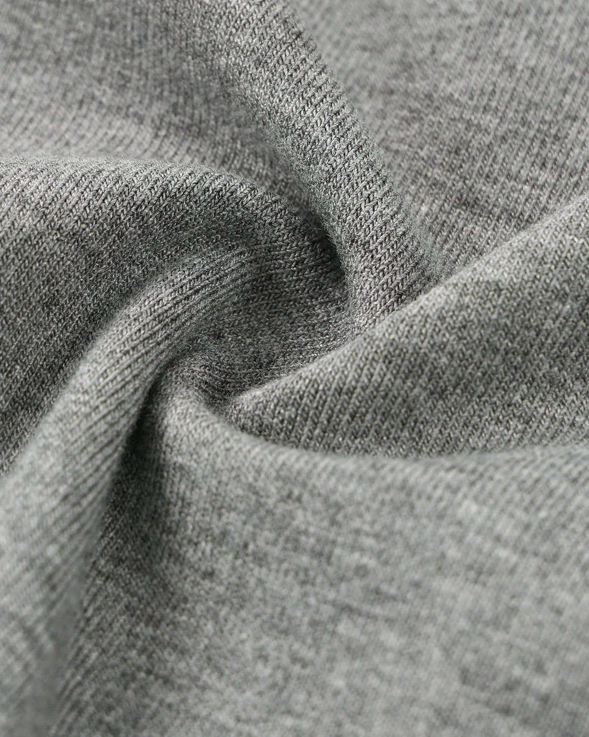 Close-up of gray fabric with a textured pattern