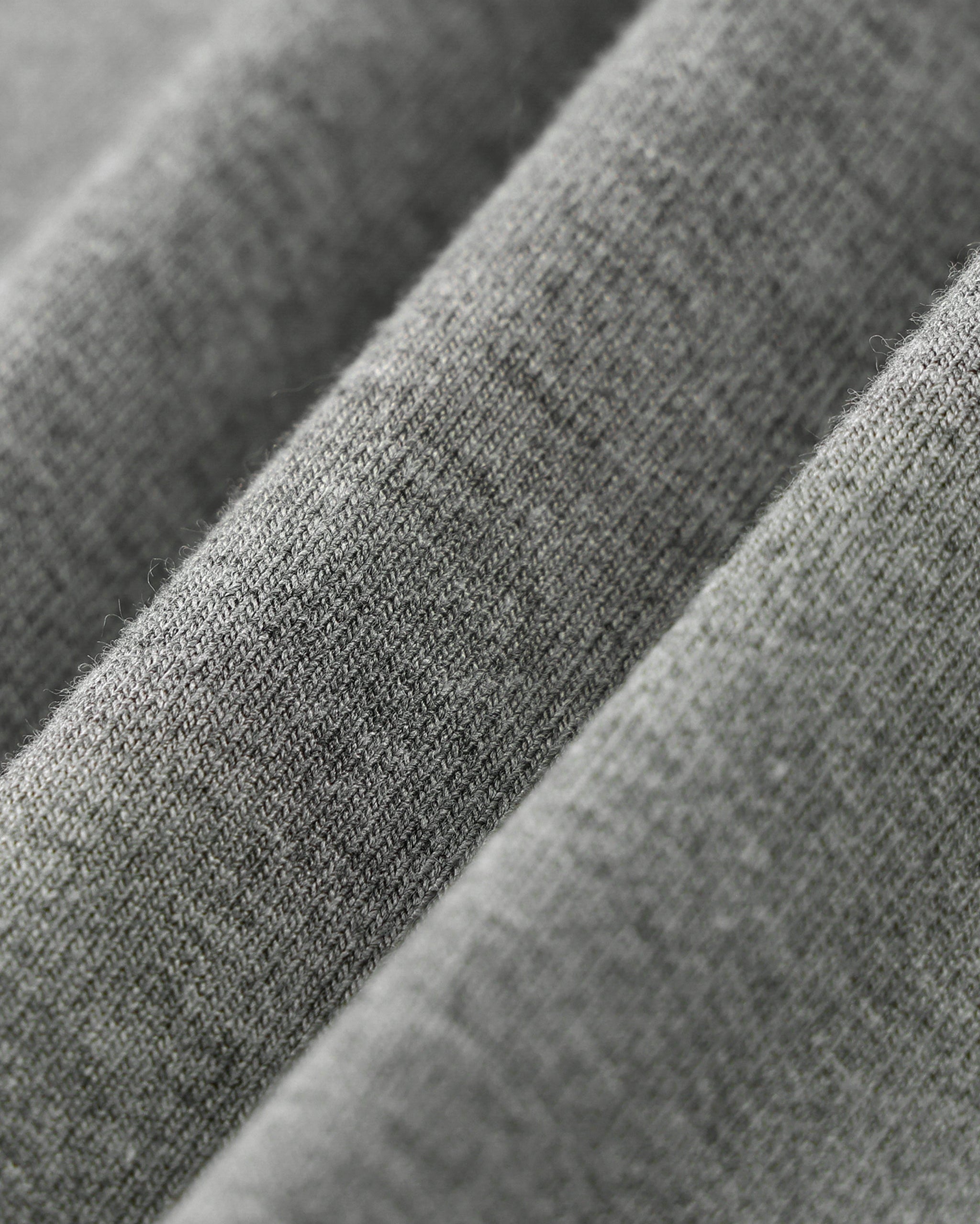 Close-up of gray fabric with a textured pattern