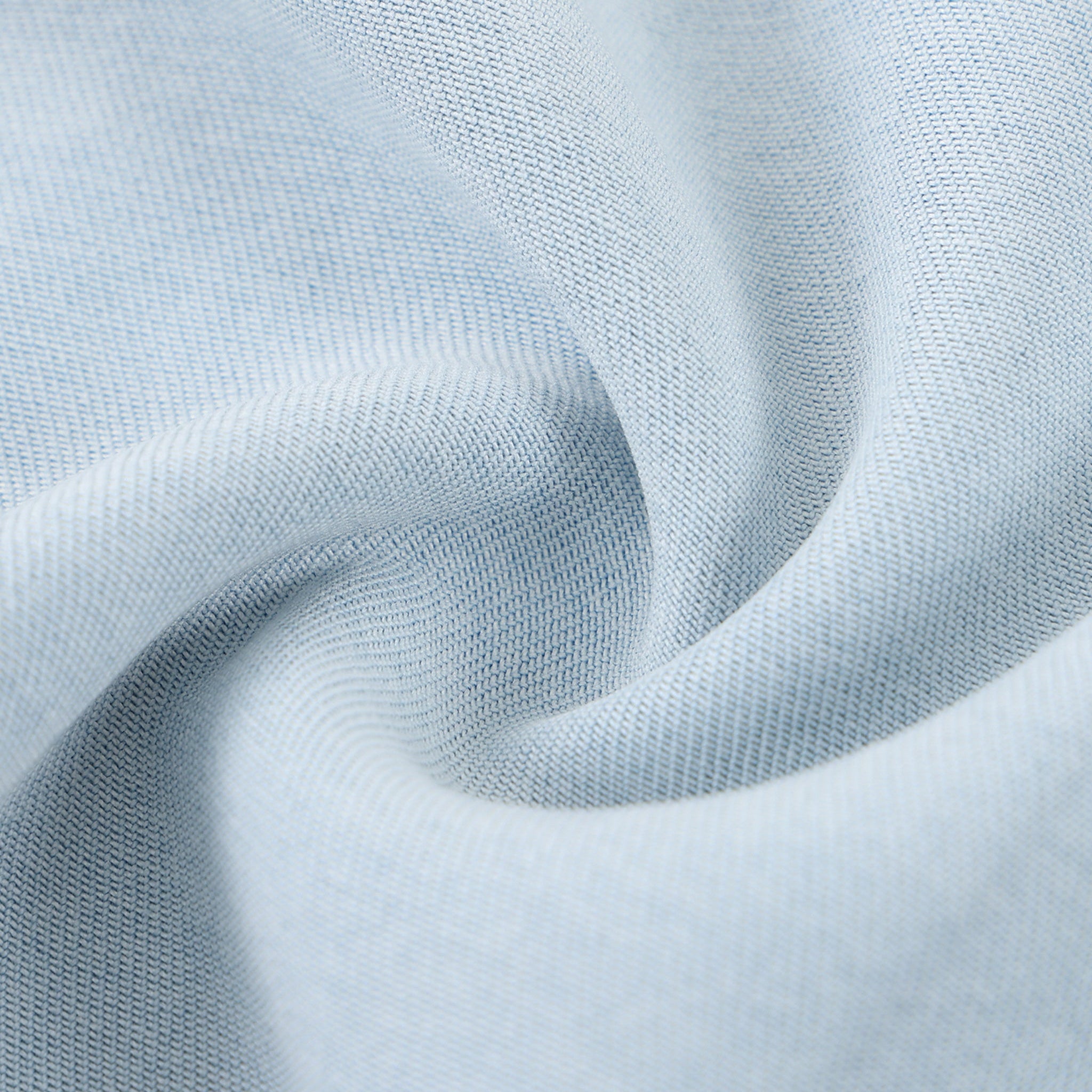 Close-up of light blue fabric with a soft texture
