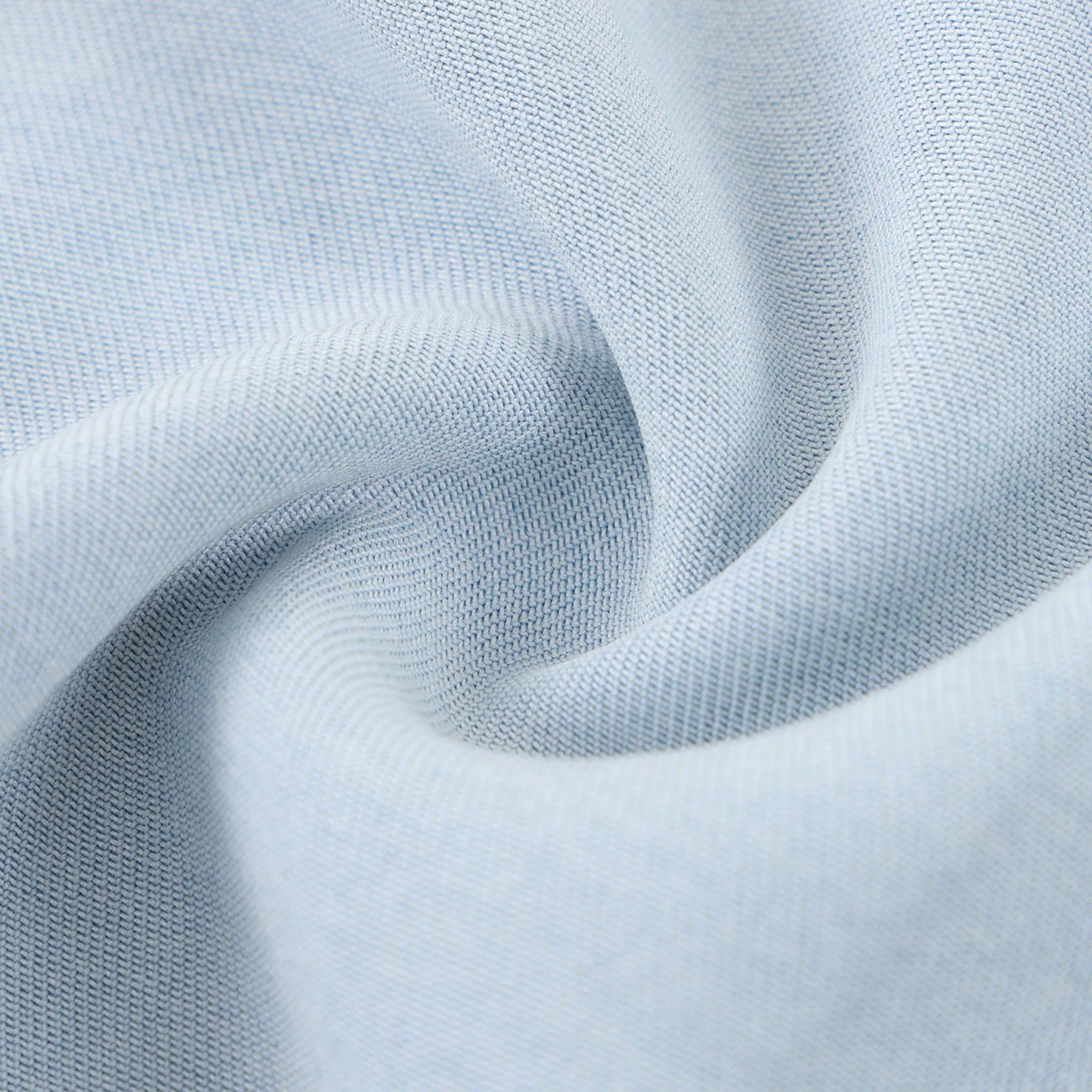 Close-up of light blue fabric with a soft texture