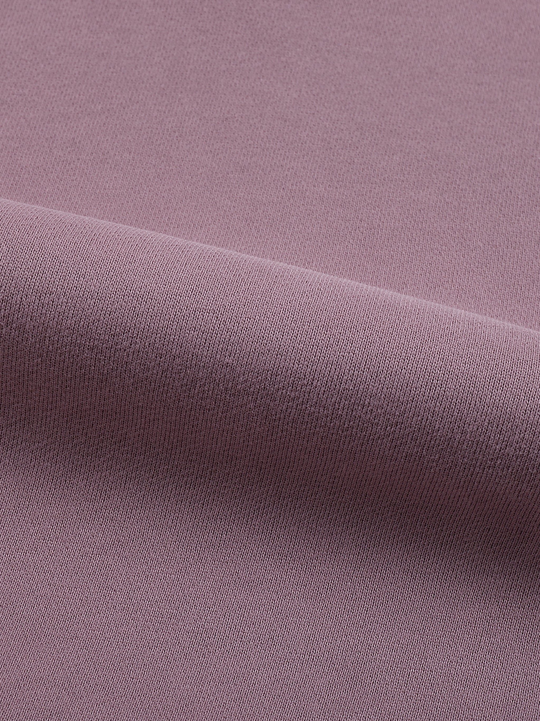 Close-up of purple fabric with a slight texture