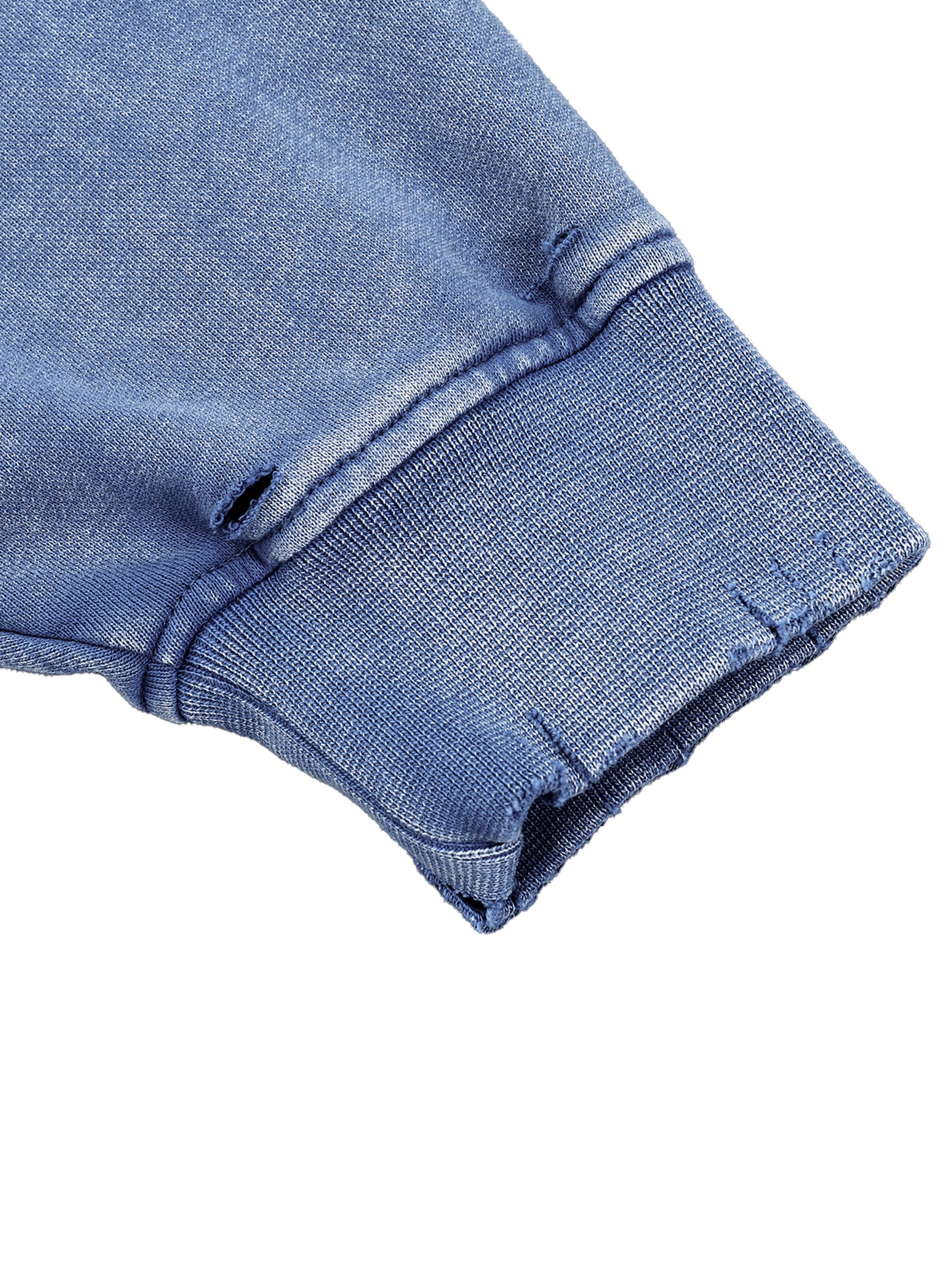Close-up of a blue fabric texture on a white background